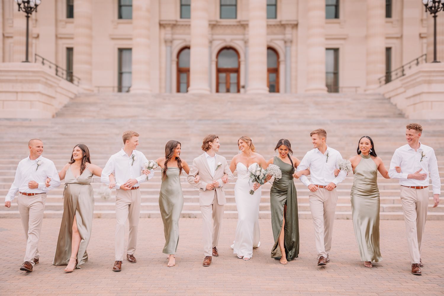 Wedding Portraits at the Topeka, KS Capitol building. Wedding party Portraits. Bride and groom with wedding parties.