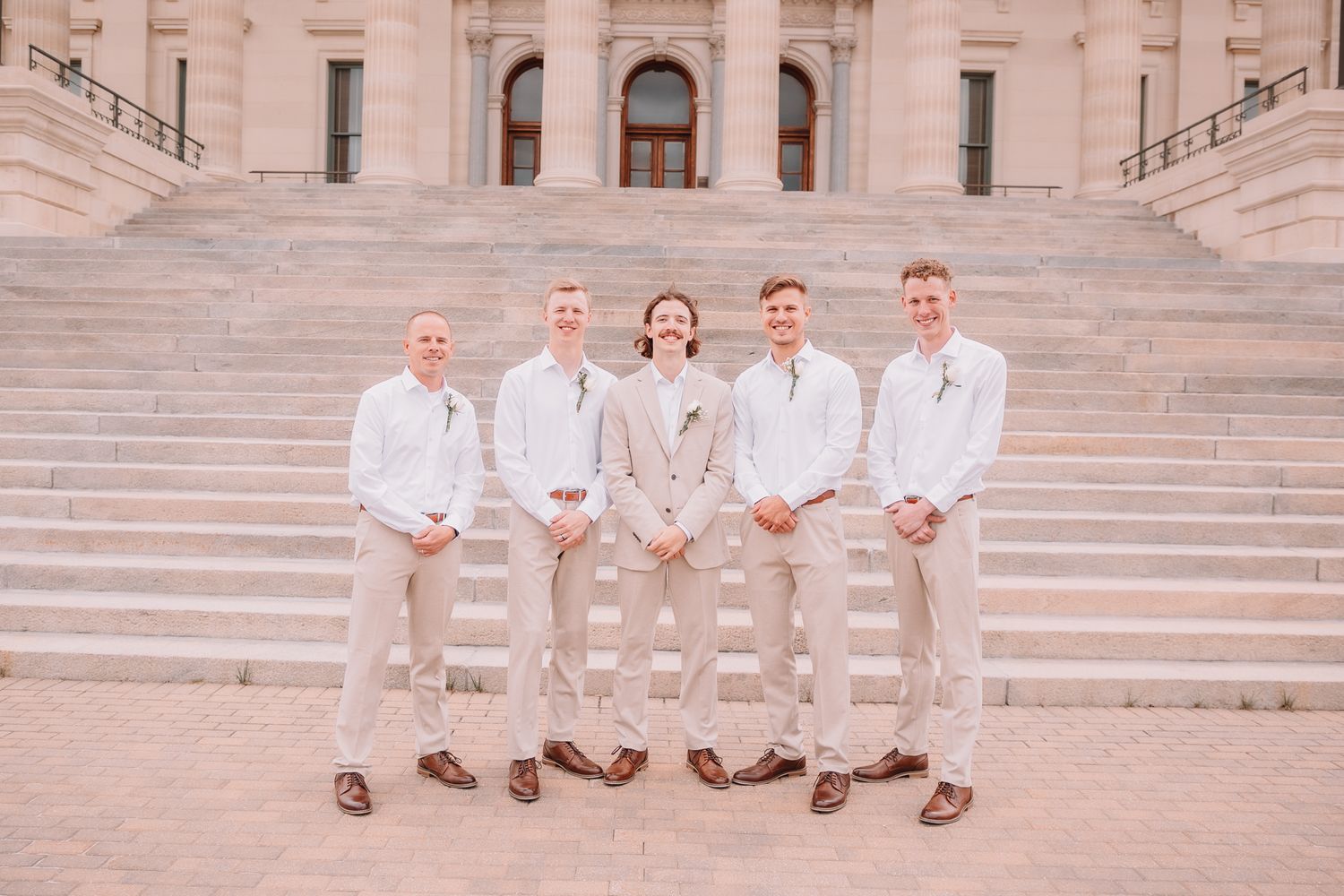Wedding Portraits at the Topeka, KS Capitol building. Family Portraits. Bride and Family.