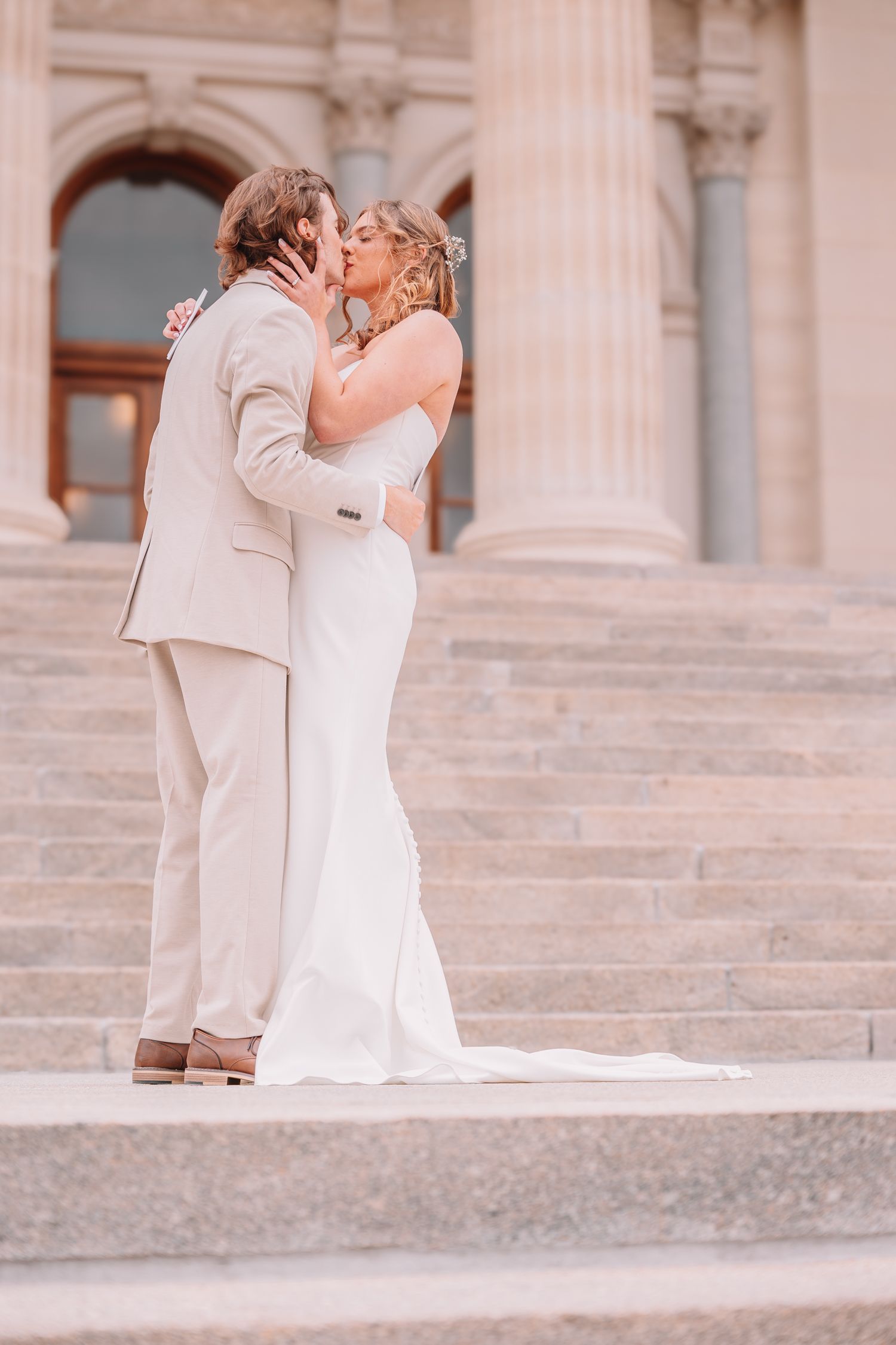 Romantic Wedding Photo of bride and groom at The Capitol building in Topeka, KS.