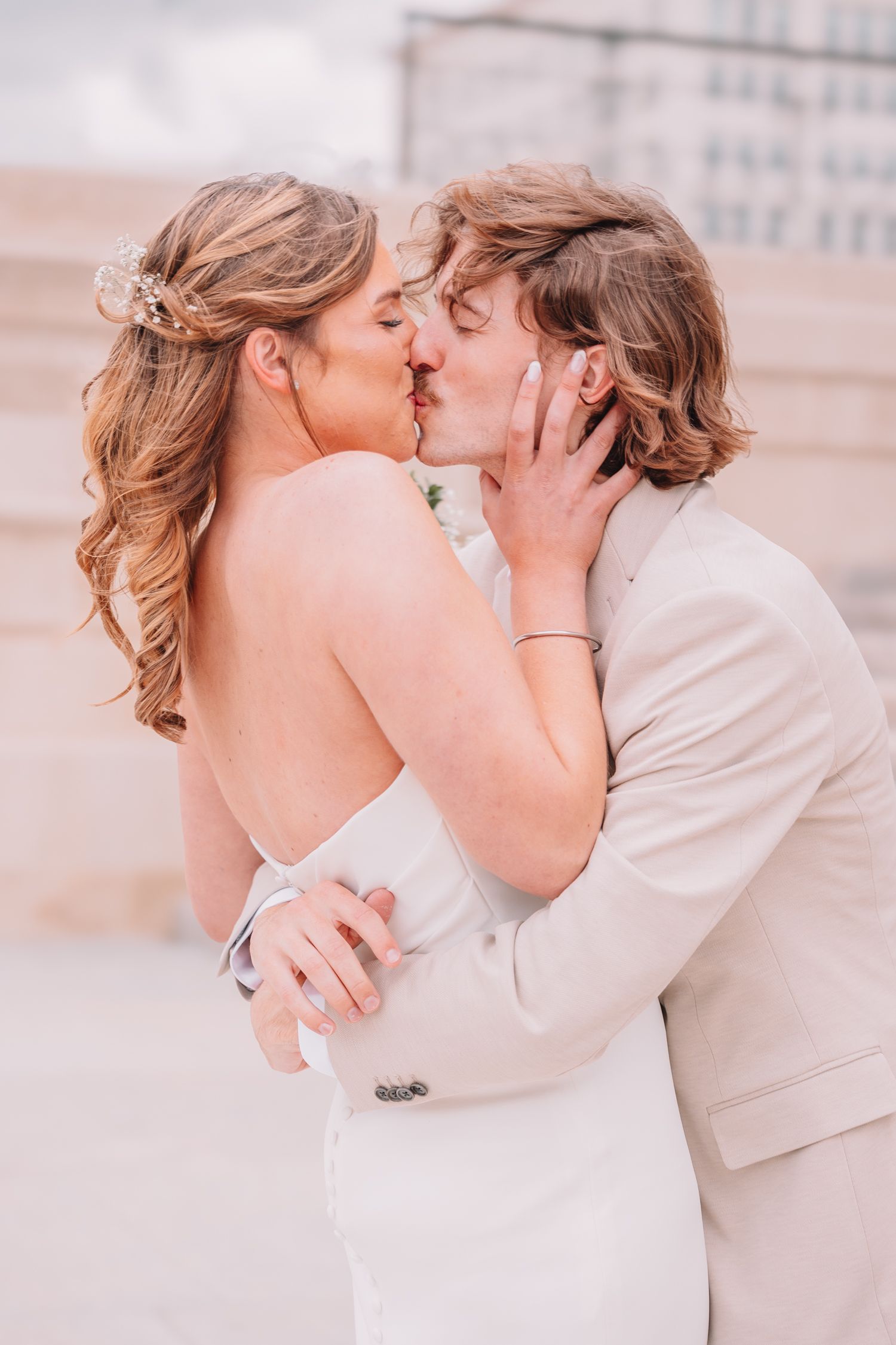 Romantic Wedding Photo of bride and groom at The Capitol building in Topeka, KS. First-look.