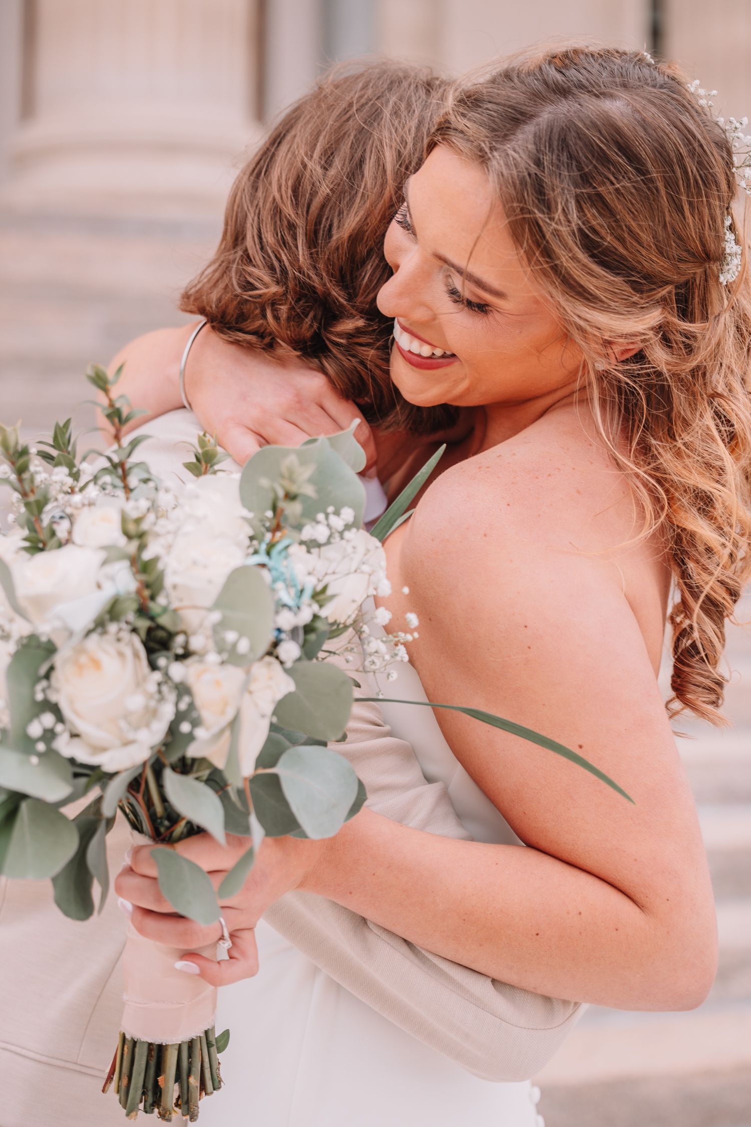 Romantic Wedding Photo of bride and groom at The Capitol building in Topeka, KS. First-look.