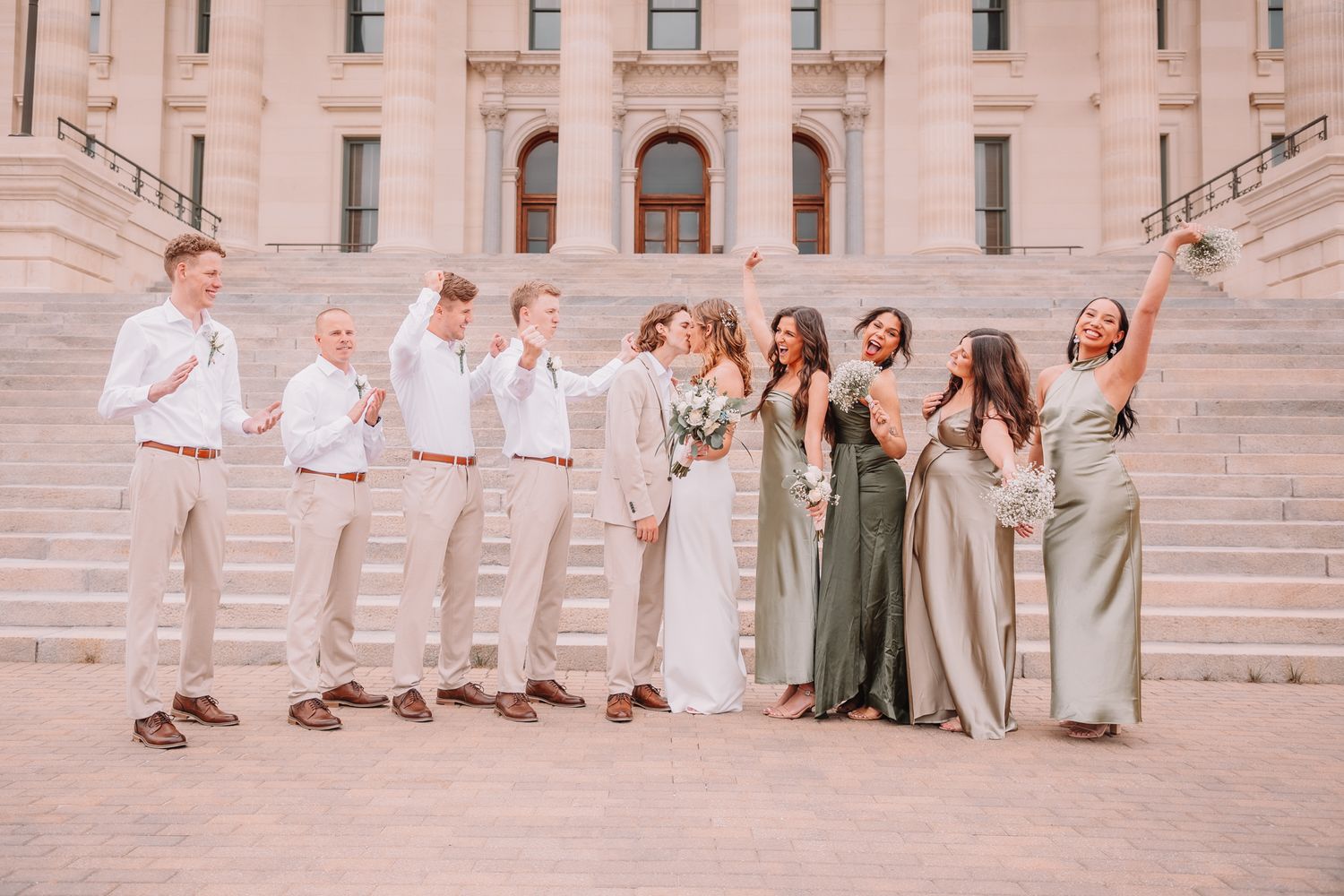 Wedding Portraits at the Topeka, KS Capitol building. Wedding party Portraits. Bride and groom with wedding parties.