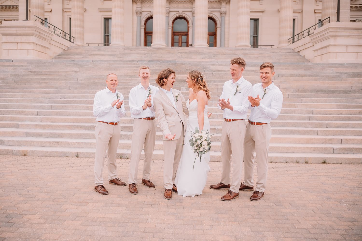 Wedding Portraits at the Topeka, KS Capitol building. Family Portraits. Bride and Groom with Family.