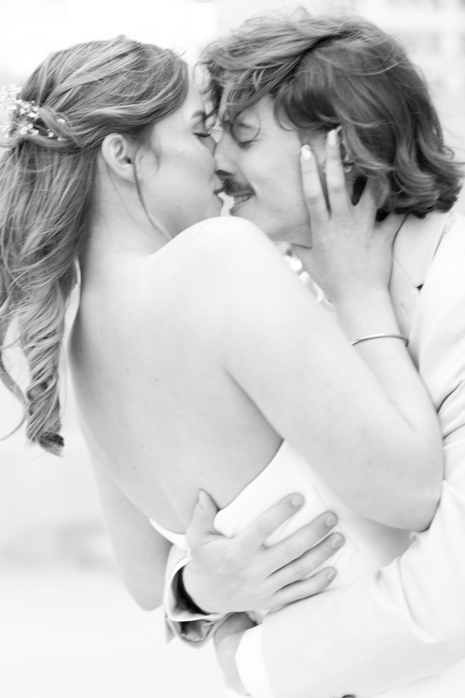 Romantic Wedding Photo of bride and groom at The Capitol building in Topeka, KS. First-look.