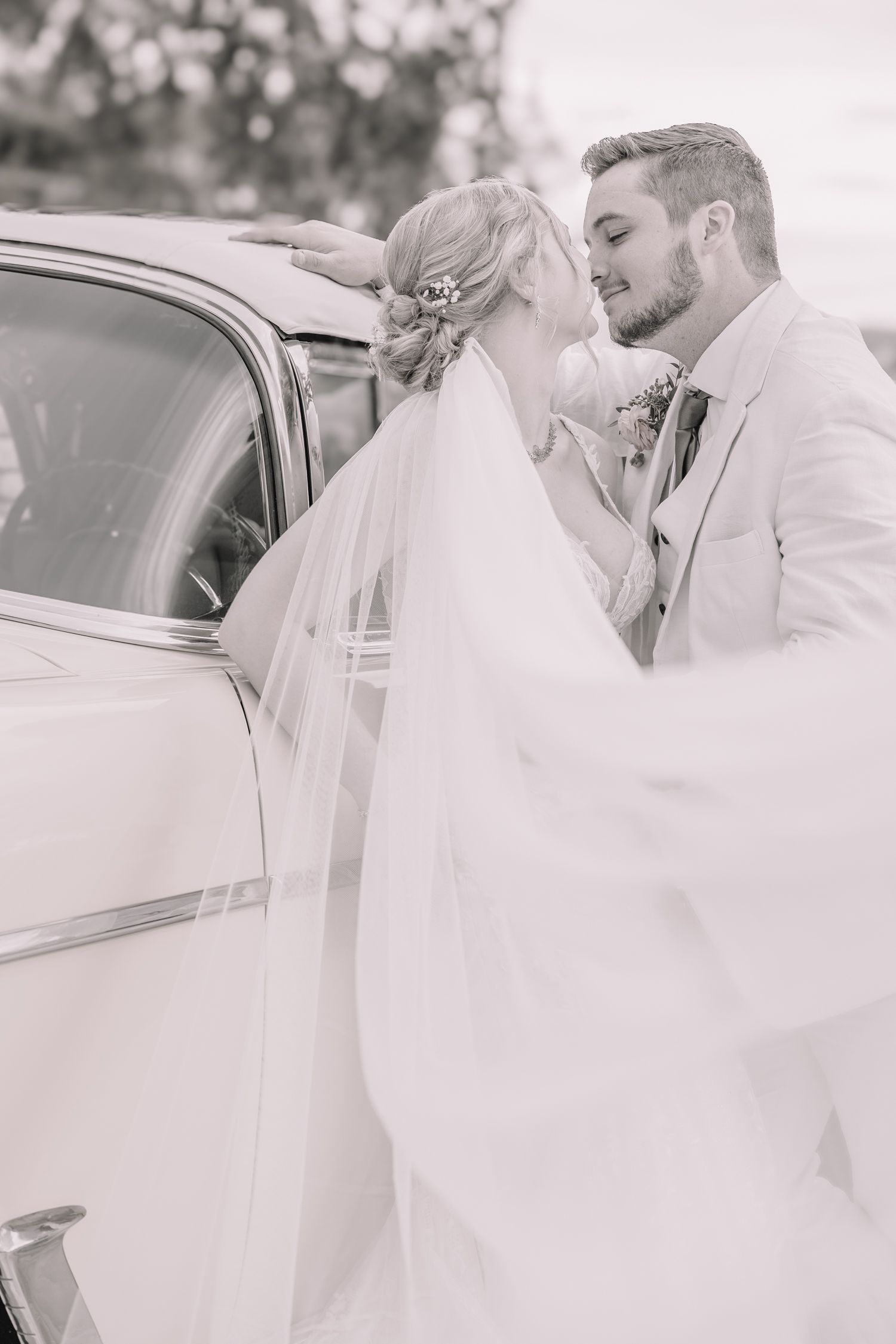 Romantic photo of bride and groom at the Brownstone. Wedding photos in Topeka, KS.