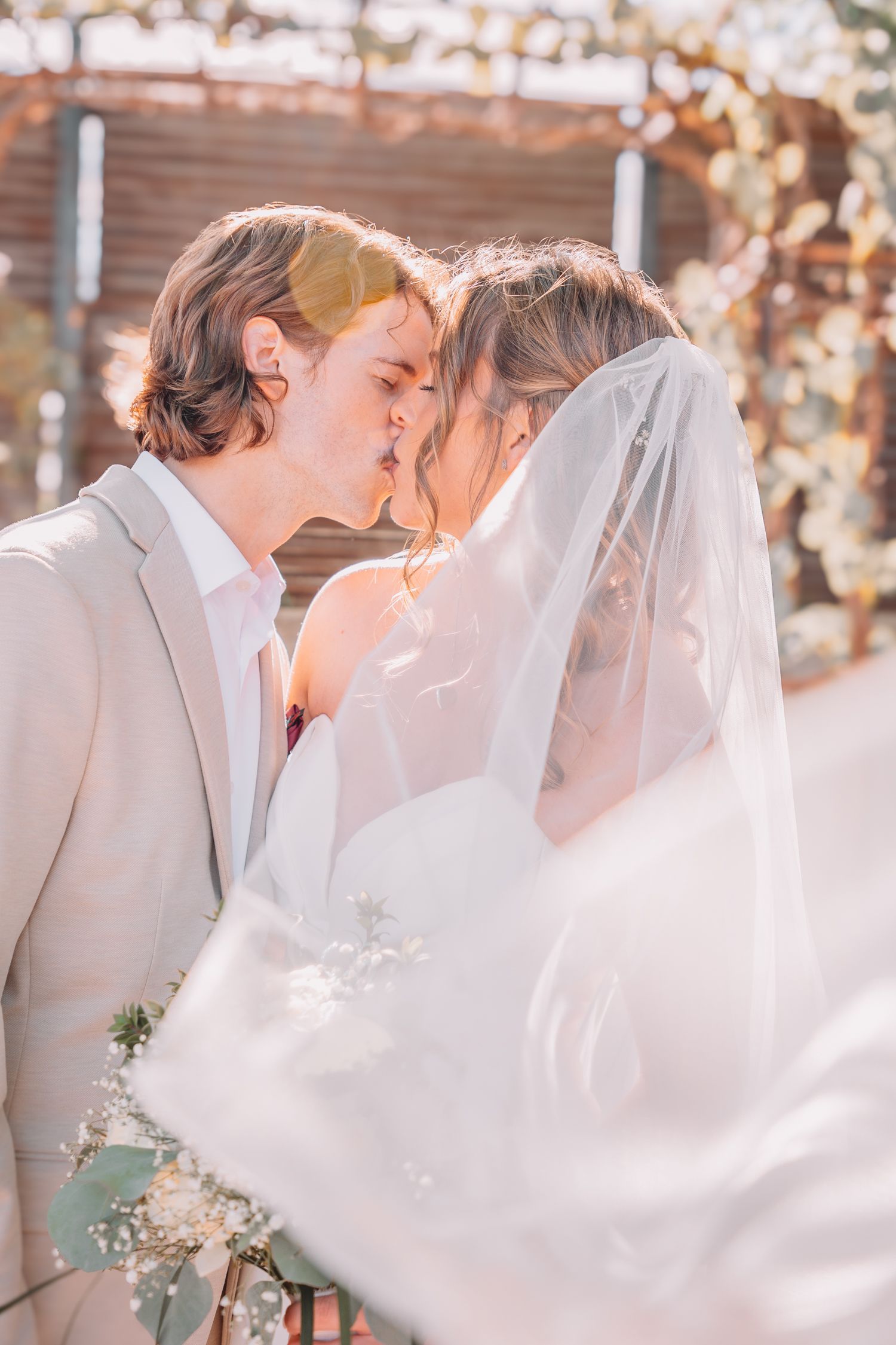 Romantic photo of bride and groom at The Foundry. Wedding photos in Topeka, KS.