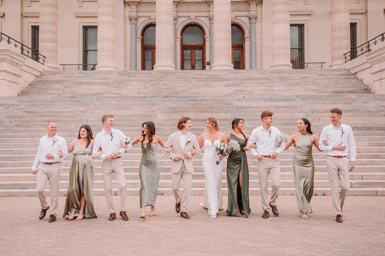 Wedding Portraits at the Topeka, KS Capitol building. Wedding party Portraits. Bride and bridesmaids. Groom and Groomsmen.