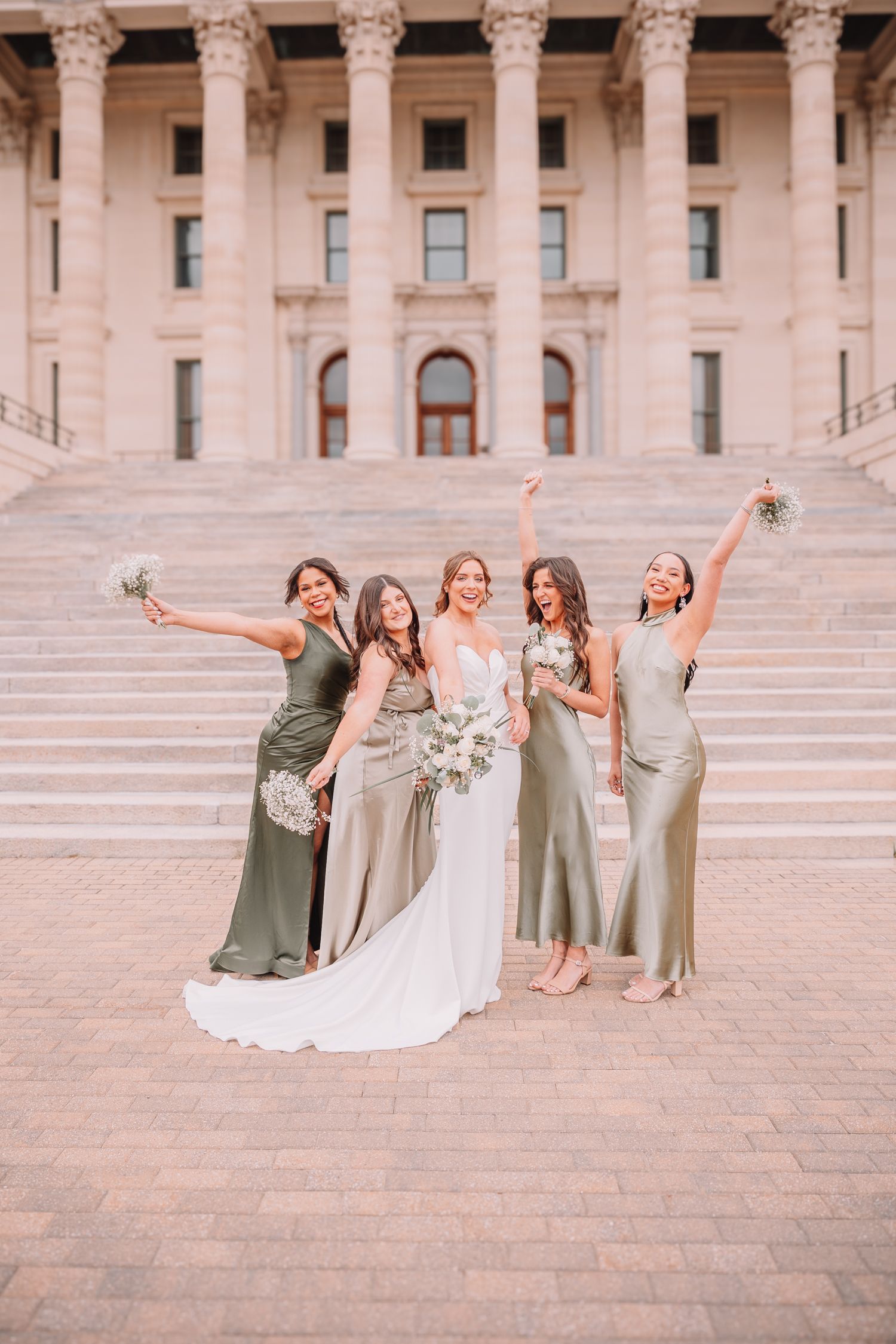 Wedding Portraits at the Topeka, KS Capitol building. Wedding party Portraits. Bride and bridesmaids.