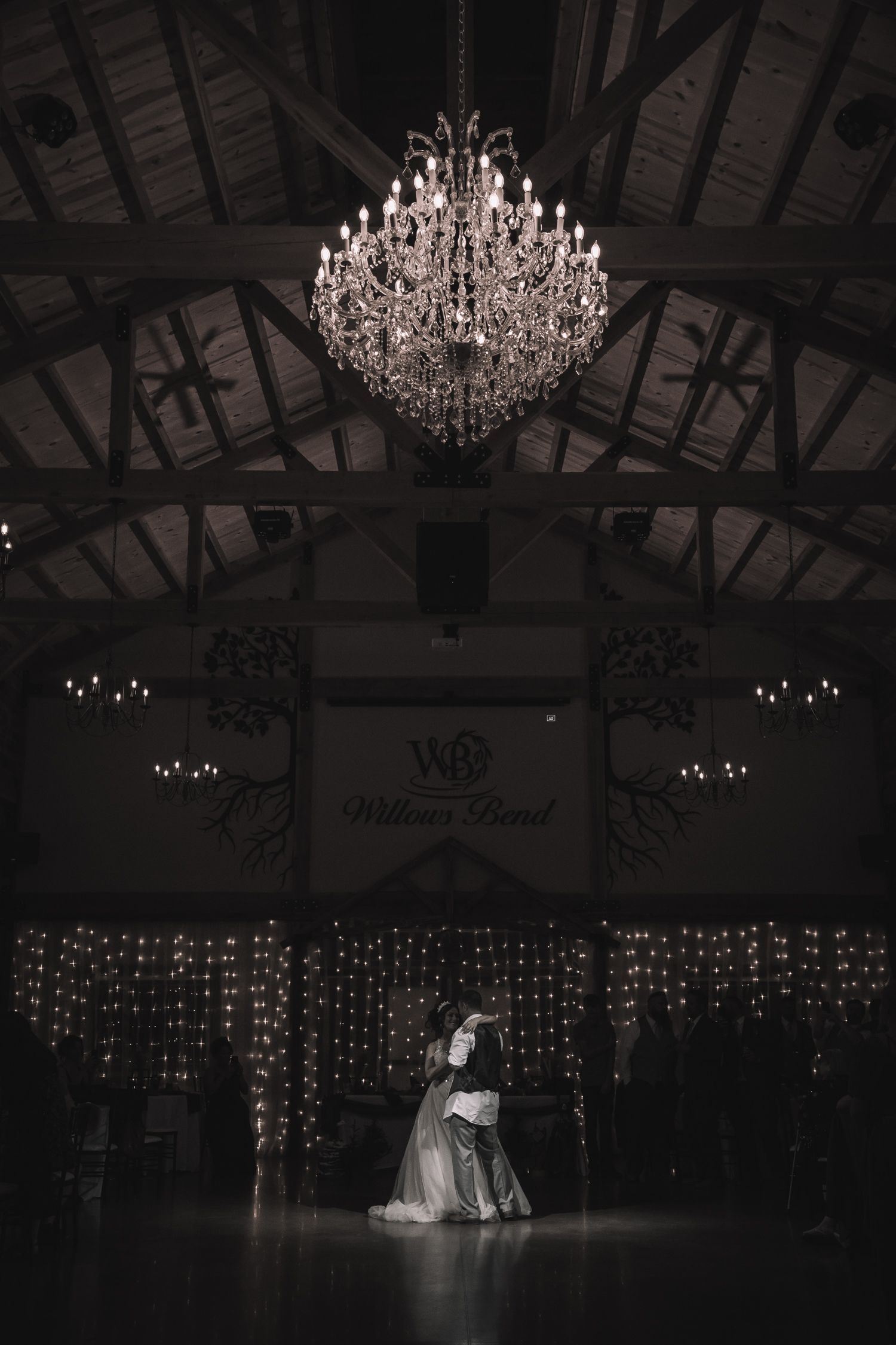 Romantic photo of bride and groom first dance at Willow's Bend.  Wedding photos in Kansas.