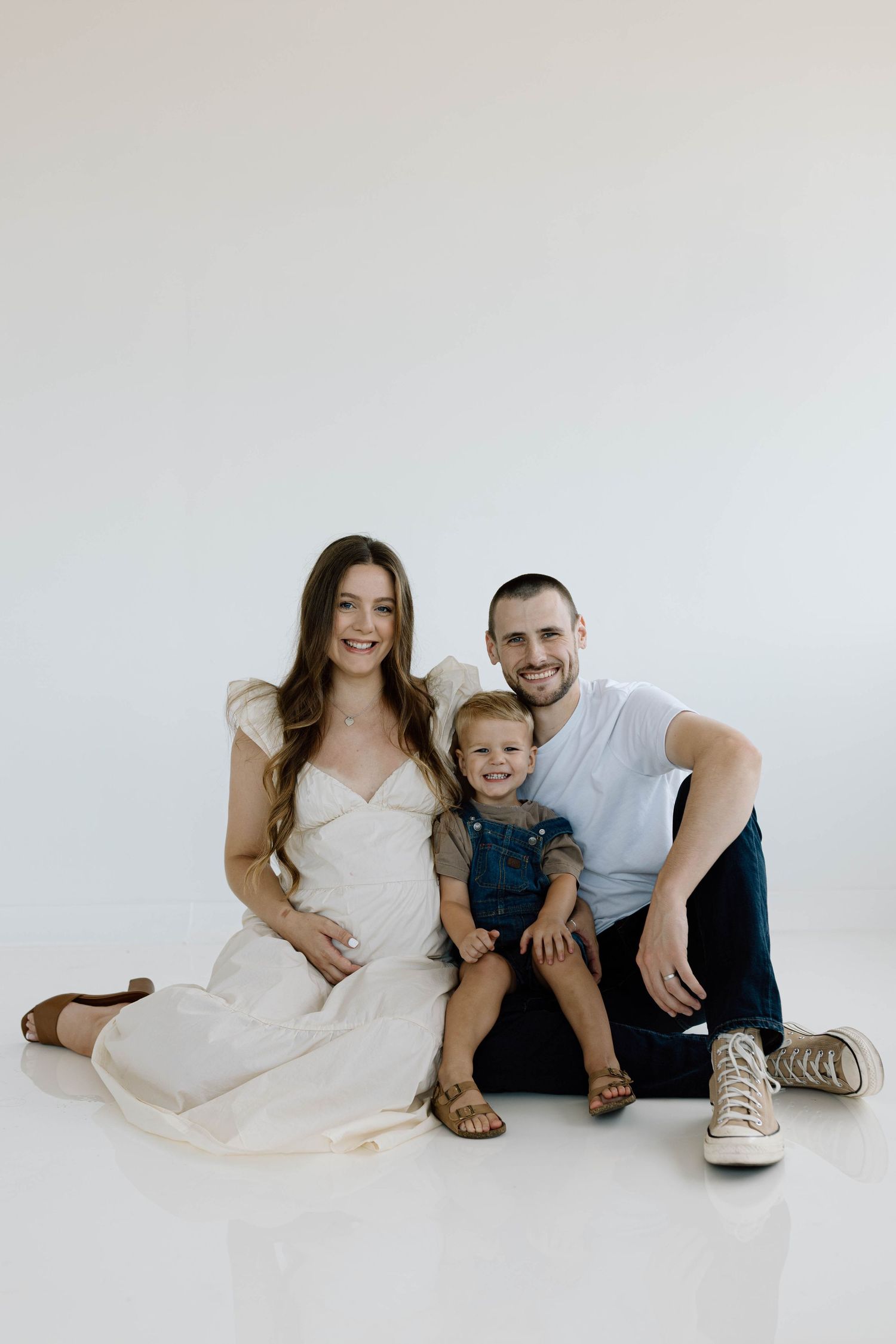 indoor studio maternity photos with family