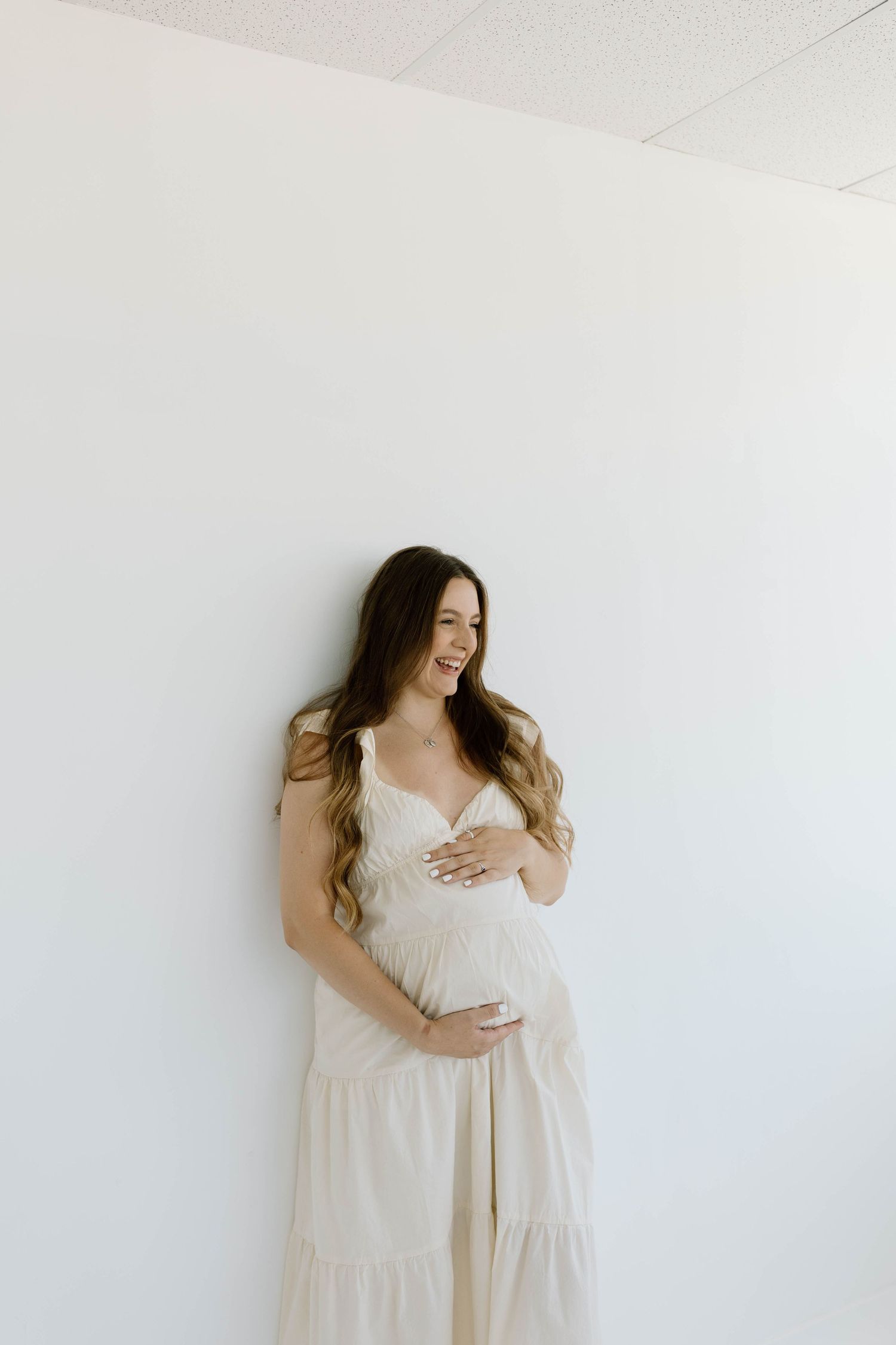 candid indoor studio maternity