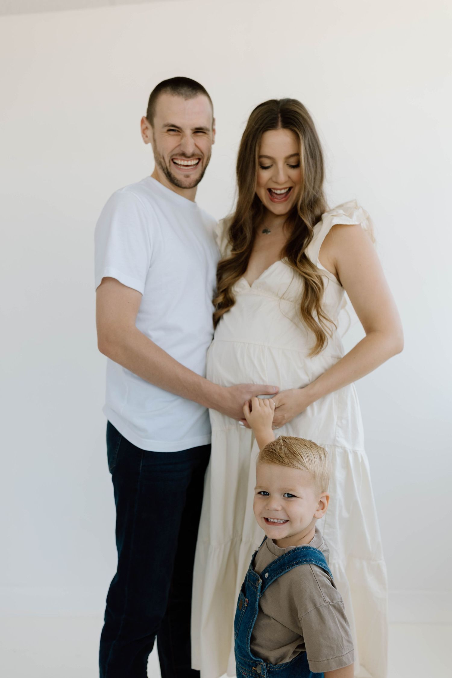 family indoor studio maternity photos