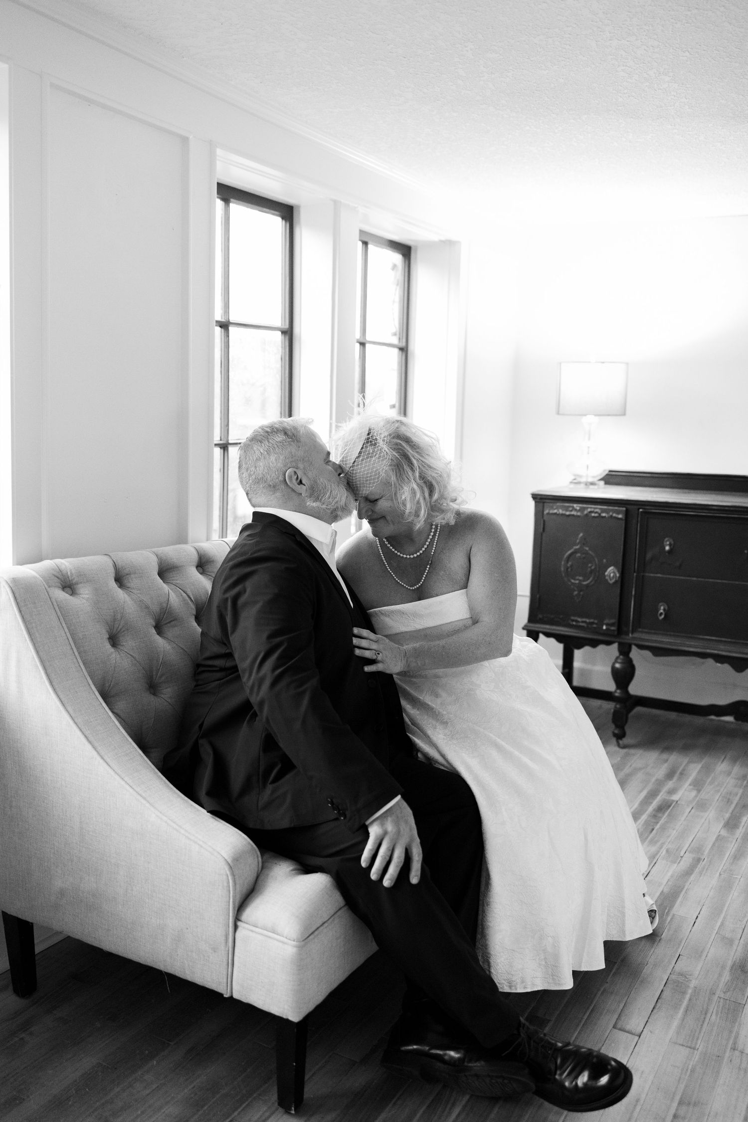 A couple enjoying a quiet moment together on their wedding day.