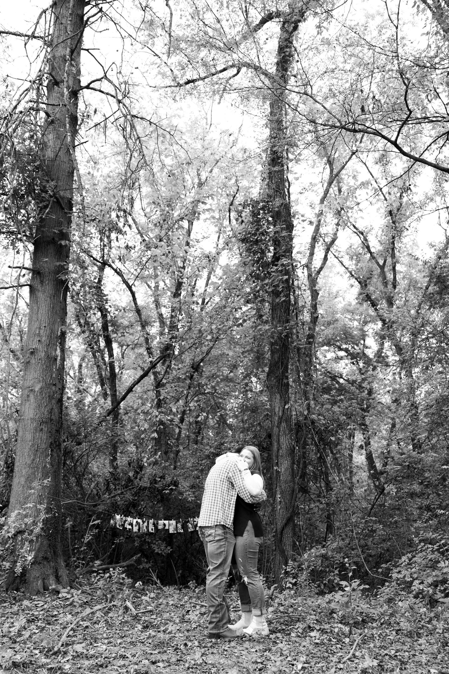 Black and white photo of engaged couple