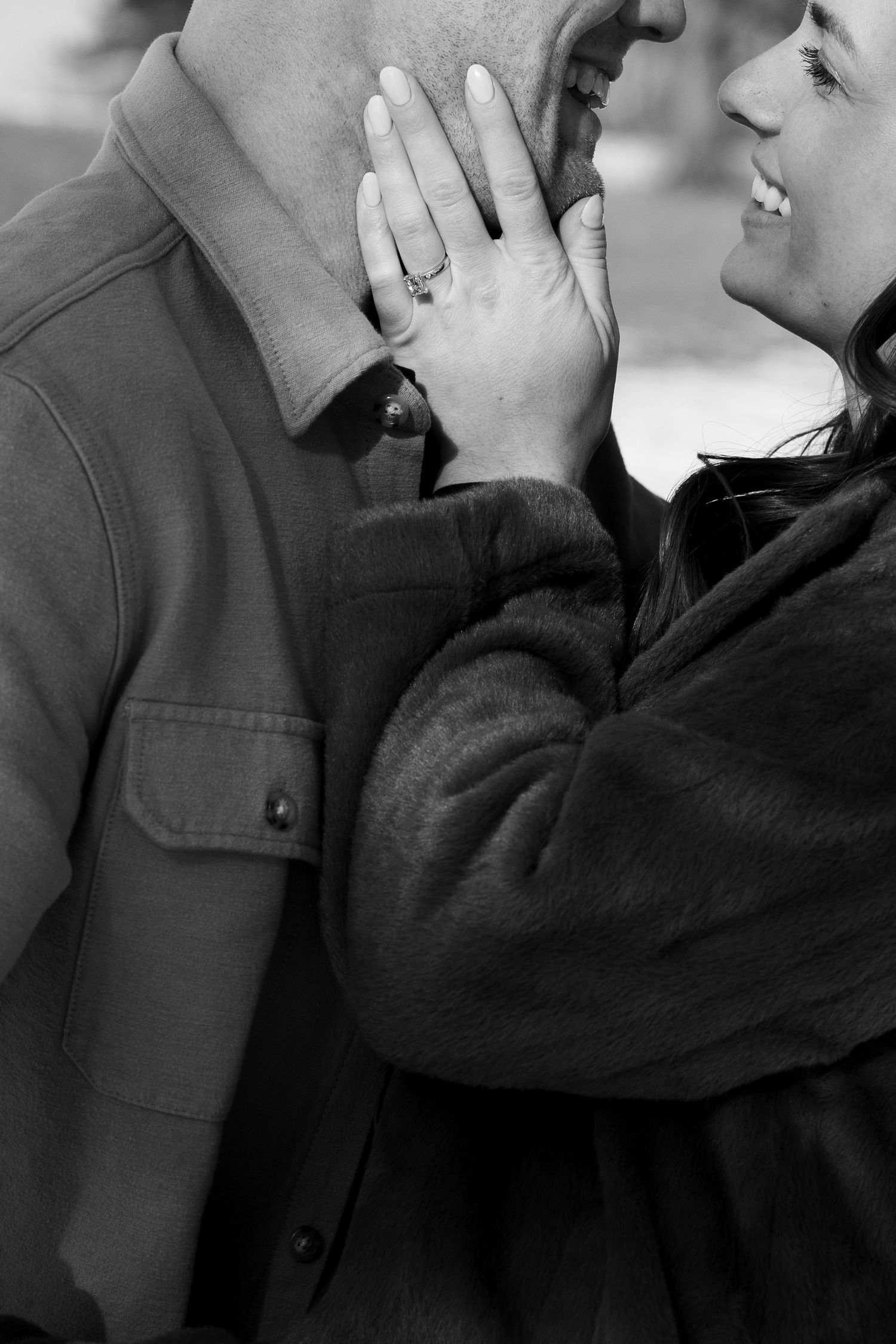 A black and white photo sequence showing two people embracing and kissing in a tender romantic moment.