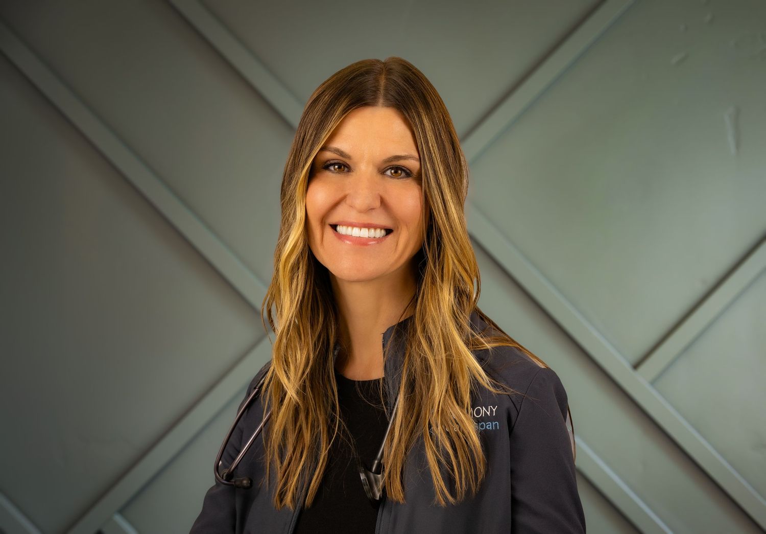 A series of six similar headshots showing someone with long brown hair smiling against a gray geometric wall background.