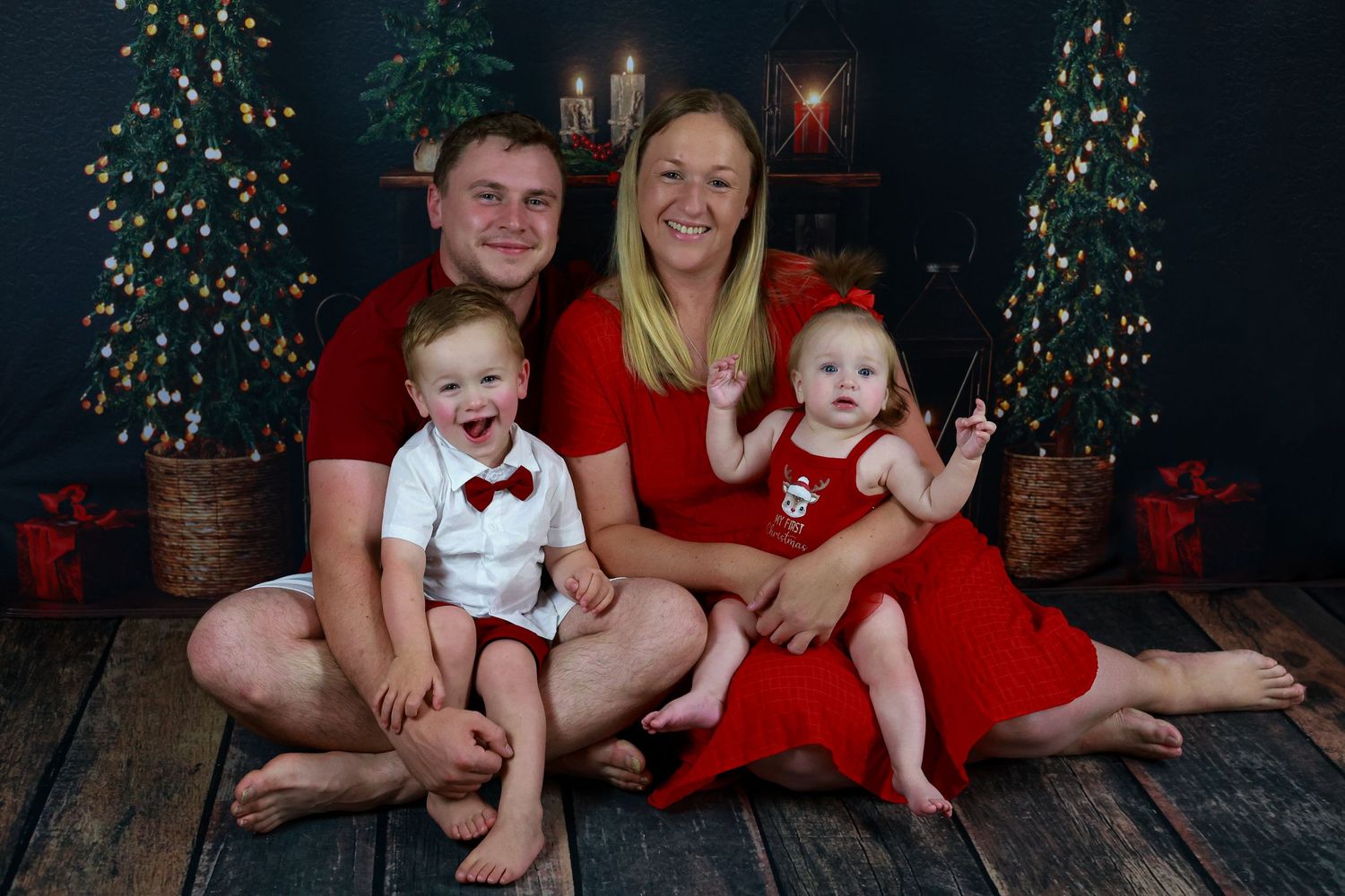 A festive holiday photo collage with coordinated red and white outfits against a backdrop of Christmas trees and decorations.