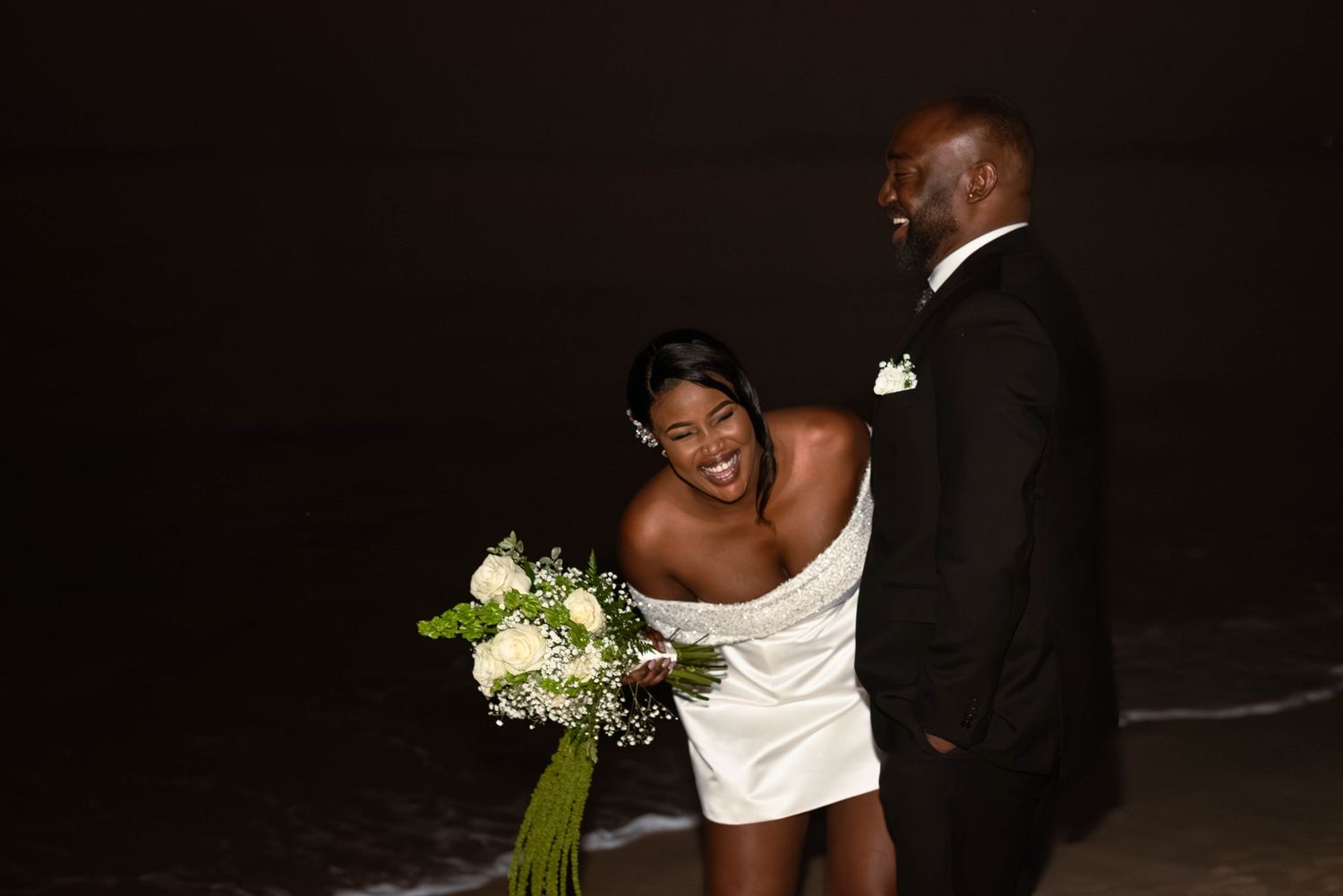 Bride and groom after elopement on the beach in Cairns