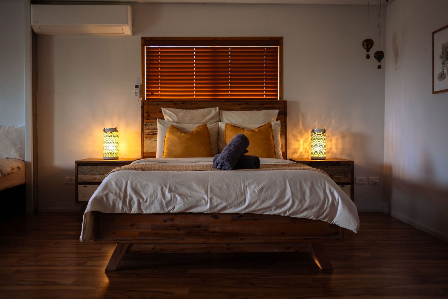 bed with warm light of a luxe stay, air bnb, Mareeba cairns air bnb photographer