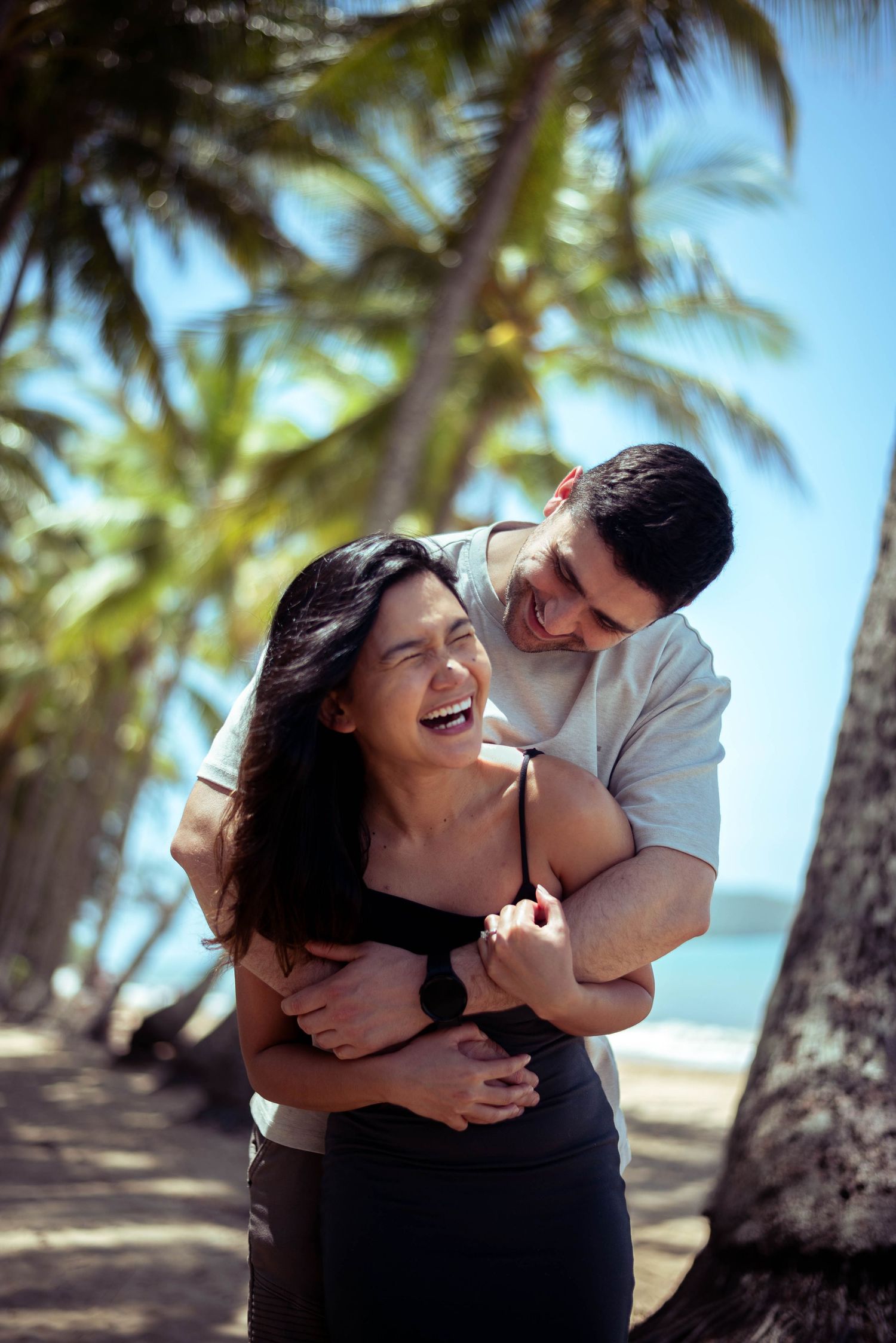 Engaged couple at beach, cairns