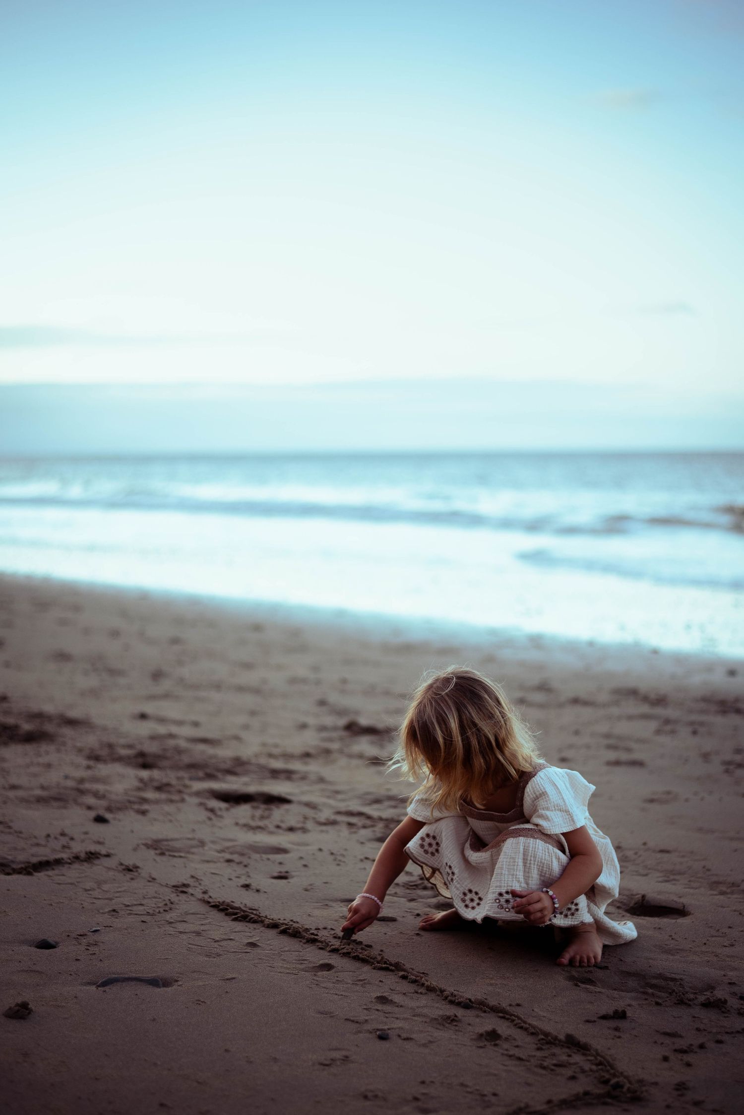 Family photos by the beach, The Tone Curve Cairns copyright