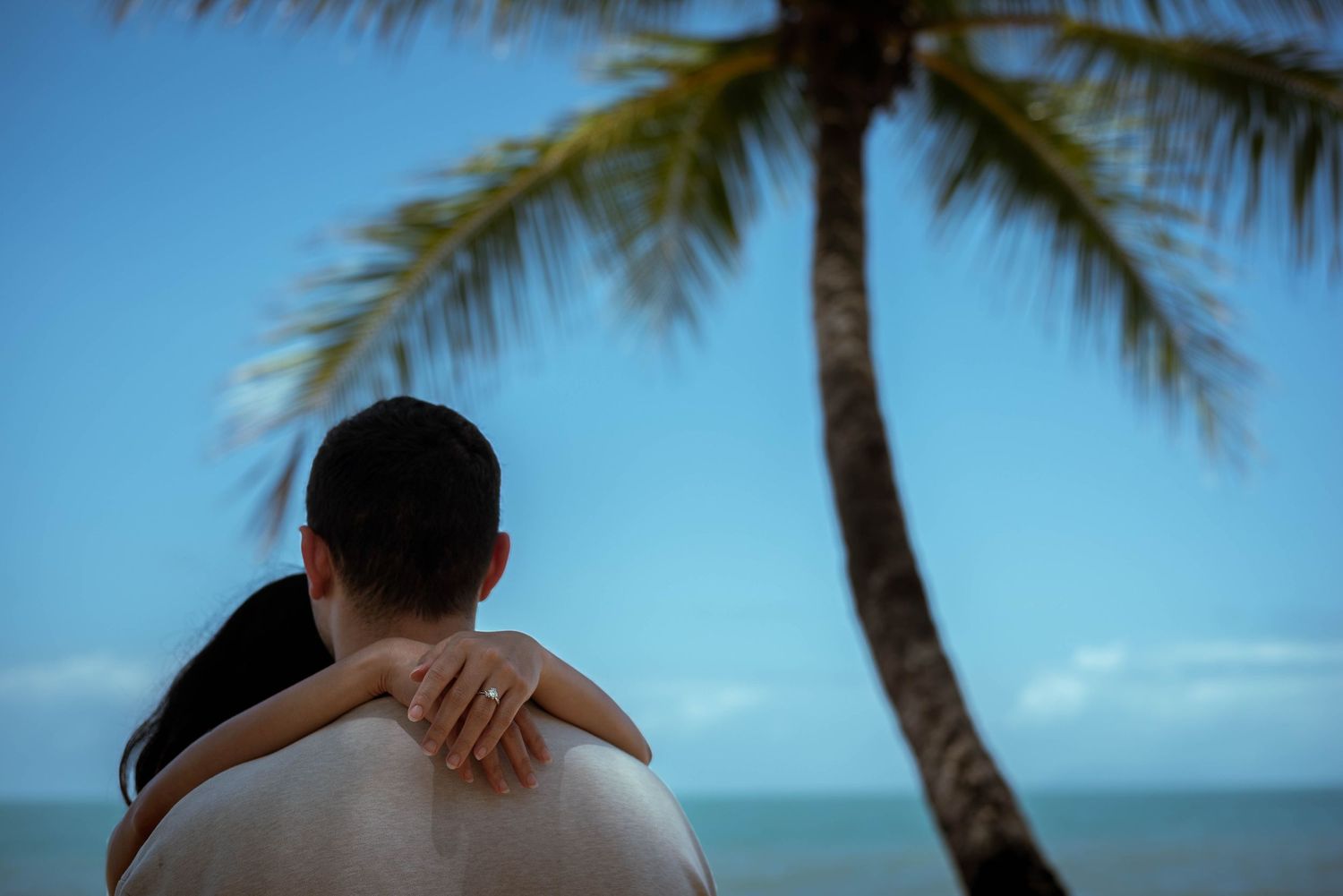 Engaged couple at beach, cairns