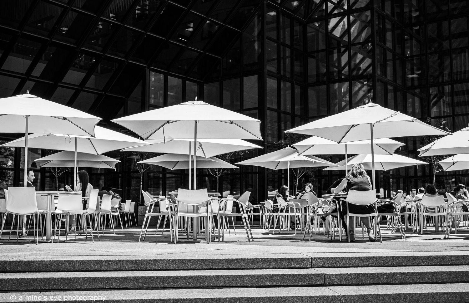 B&W architectural photo, building, graphical image,  eyes, pattern, light, shadows, texture, details, abstract, exterior, people, downtown