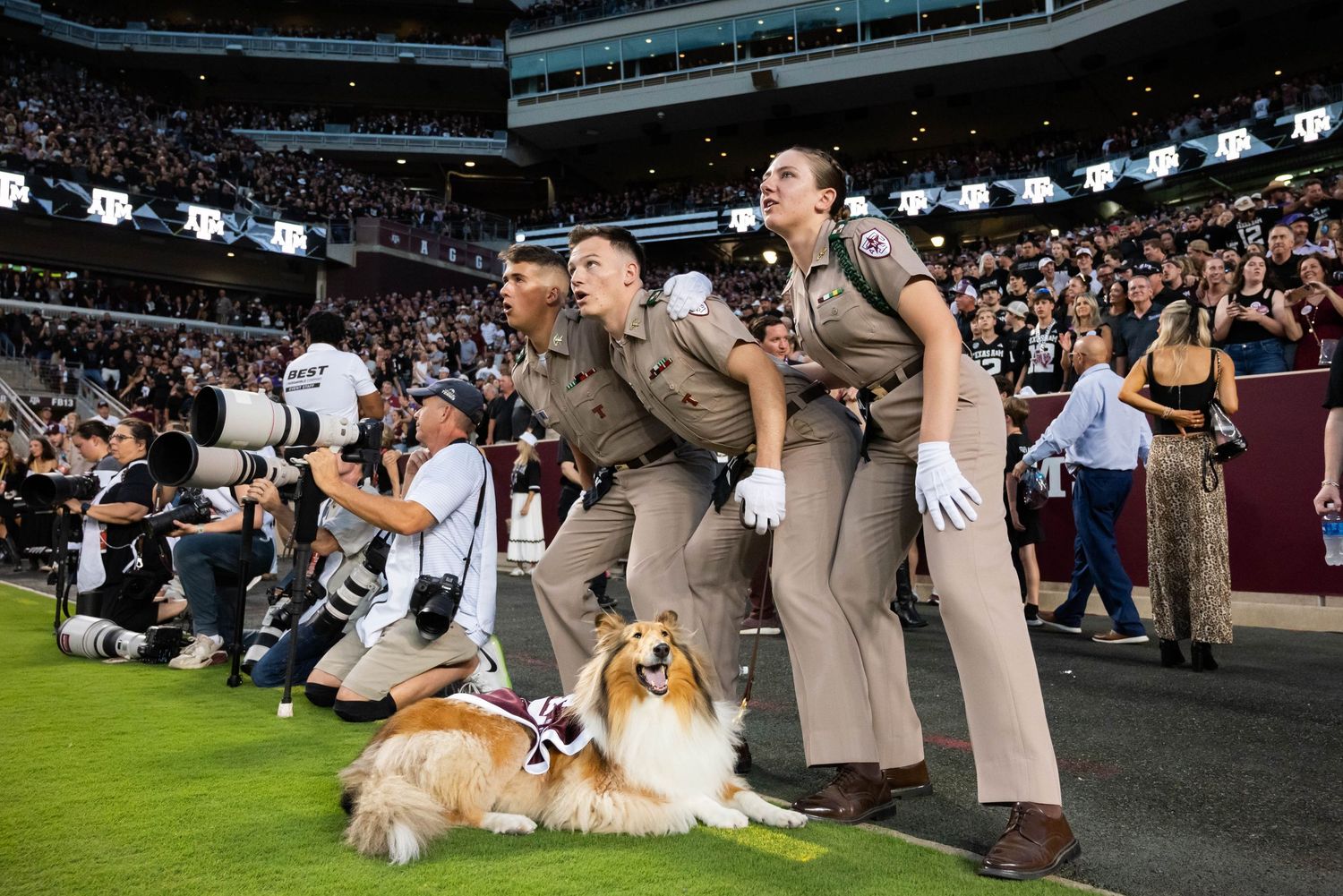 Reveille X with her handlers during the 2024 football season