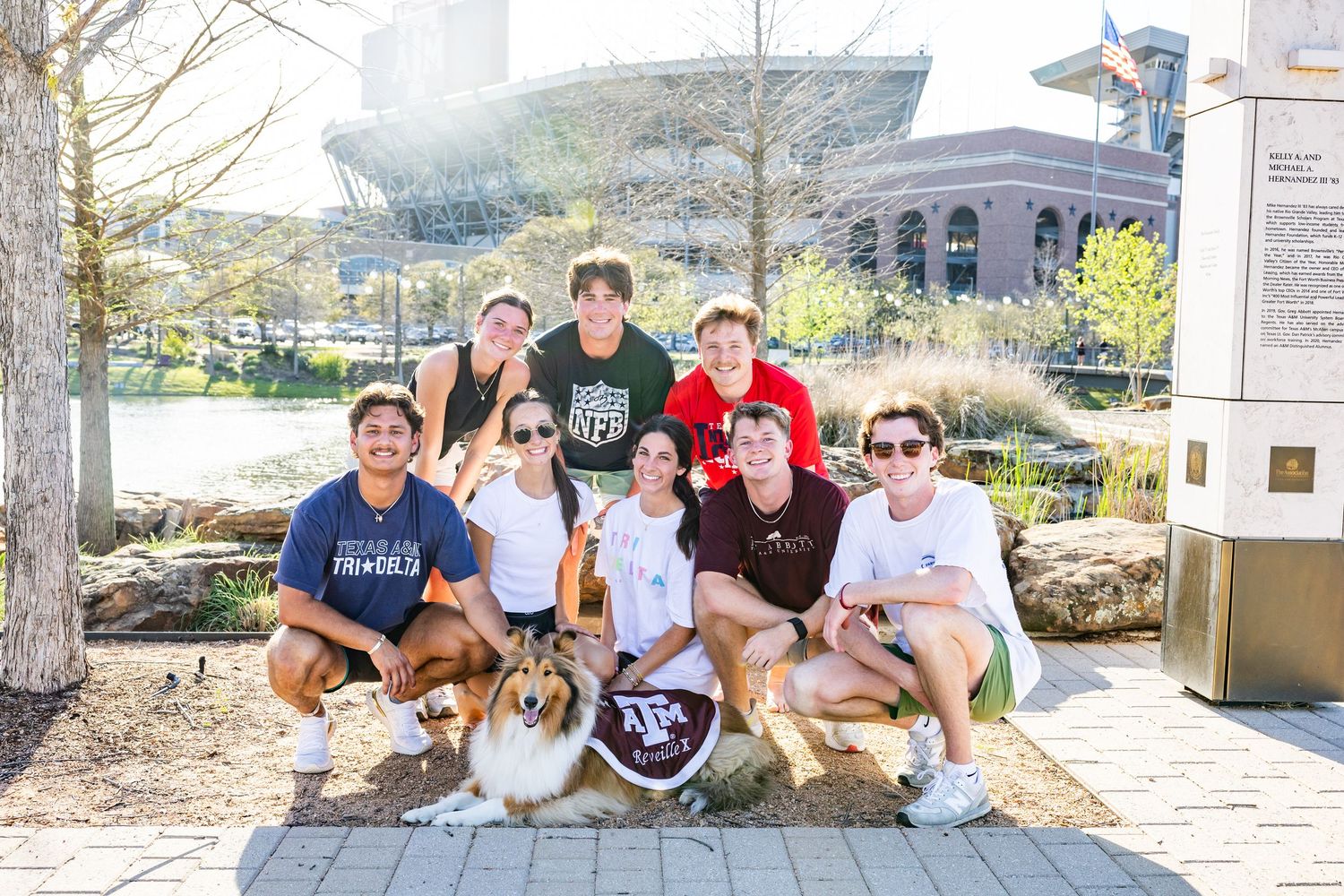 Reveille X with students in Aggie Park