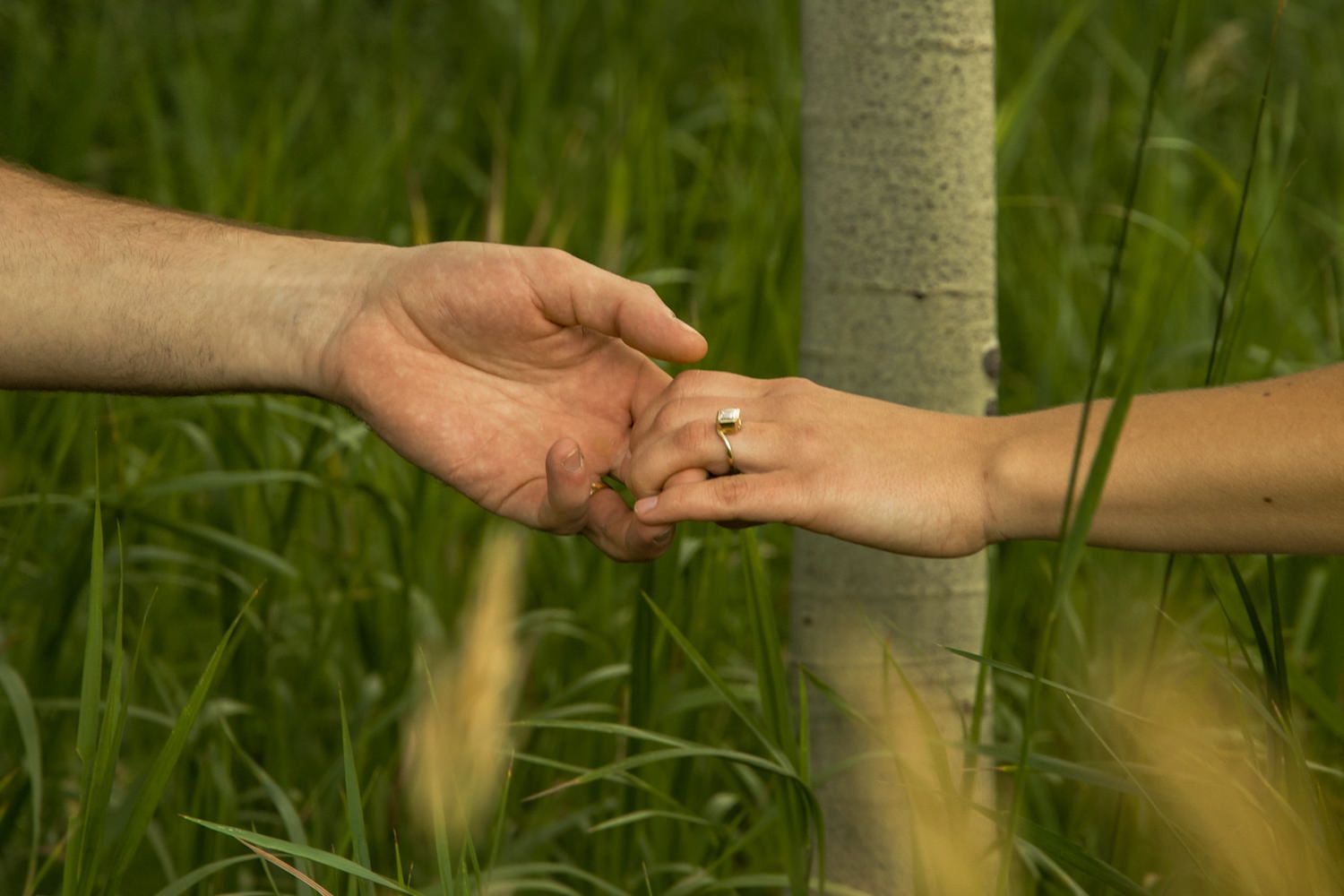 Holding hands with that fresh engagement ring during an engagement photoshoot in a Marmalade neighborhood in Salt Lake City, Utah.
