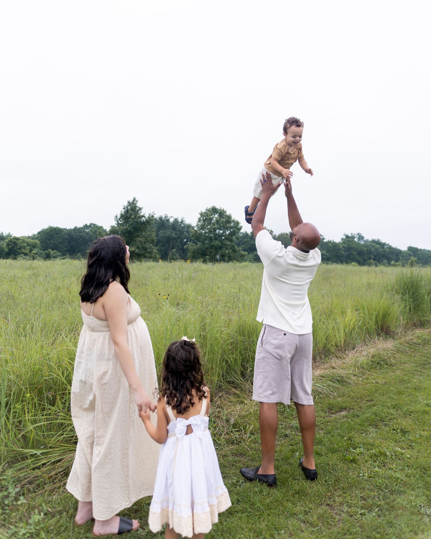 A sequence of outdoor summer photos in a grassy field showing people playing and dancing together at sunset.