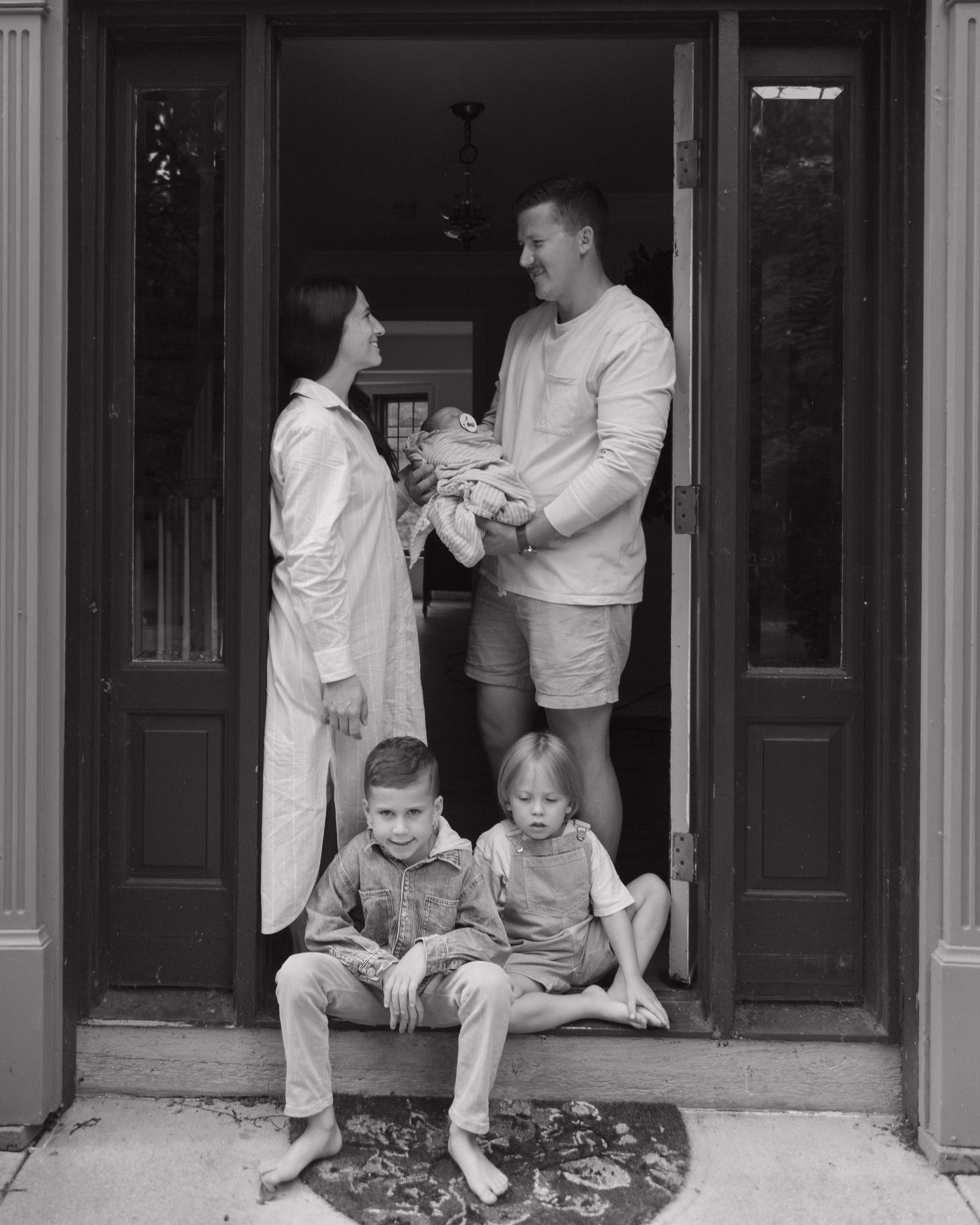 Three vintage black and white photographs show people in white clothing sitting on a porch with dark doorways behind them.
