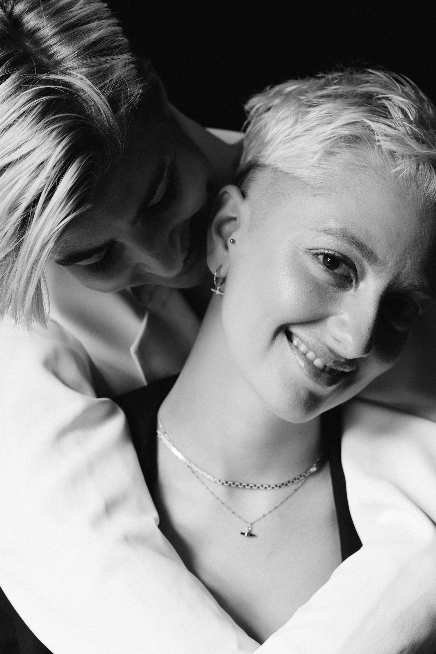 candid same-sex couple laughing Berlin