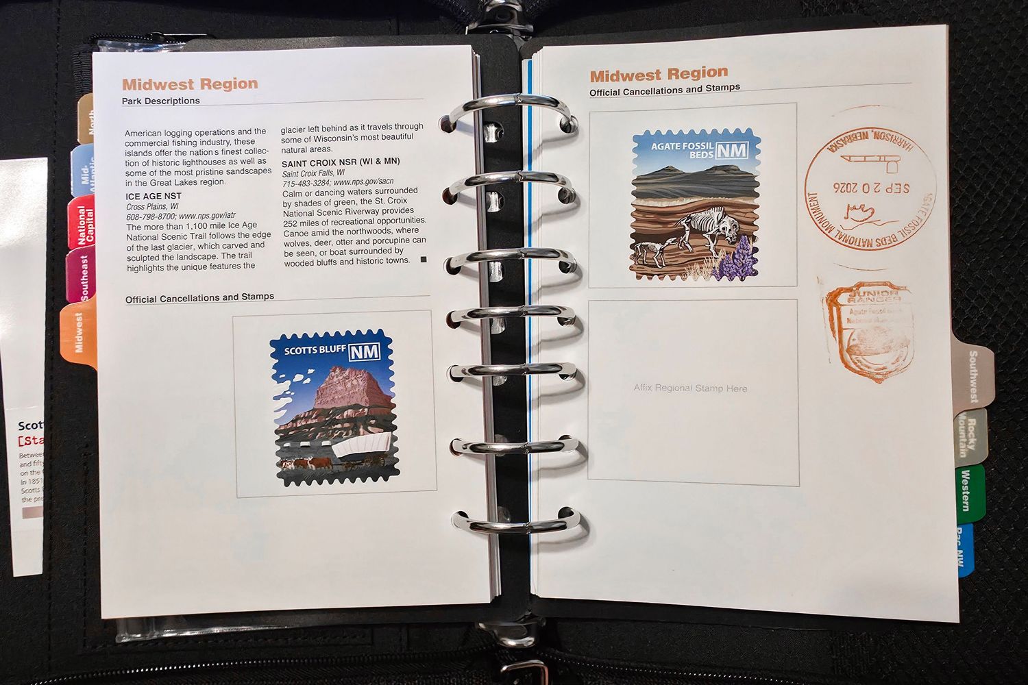 Open National Parks Passport Explorer Edition showing Scotts Bluff and Agate Fossil Beds stamps