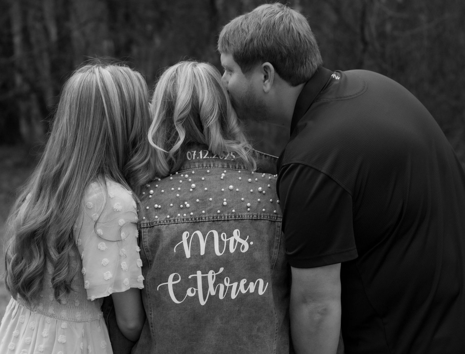 A series of black and white wedding photos showing romantic moments between newlyweds with custom lettered jackets.