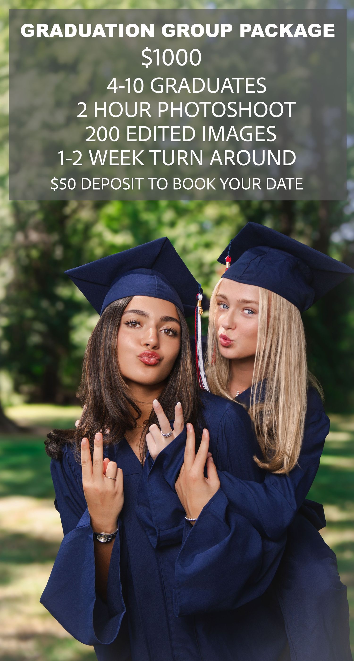 Two graduates in navy blue caps and gowns pose playfully together during a graduation photoshoot in a park setting.