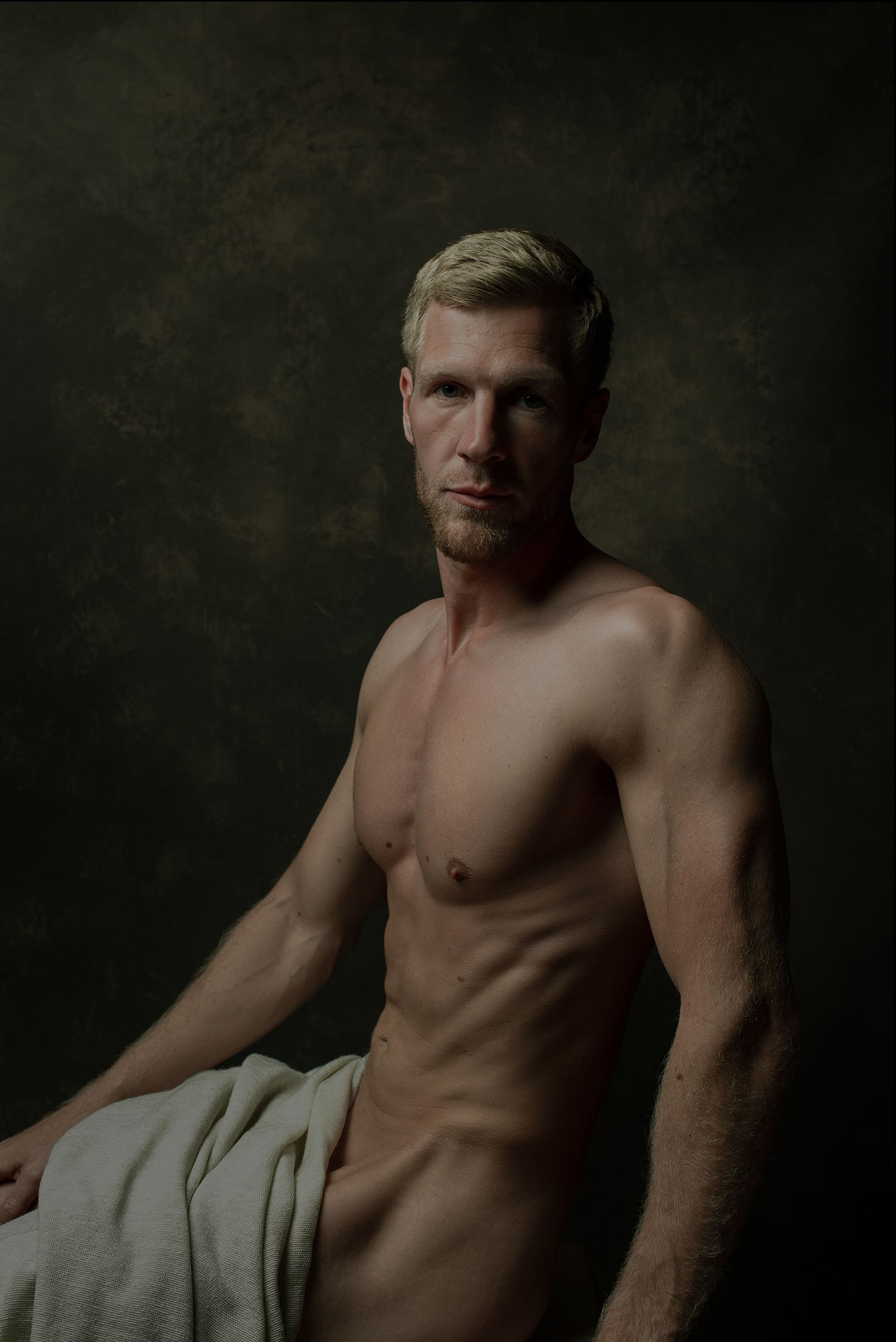 Fine-art portret van gespierde man
