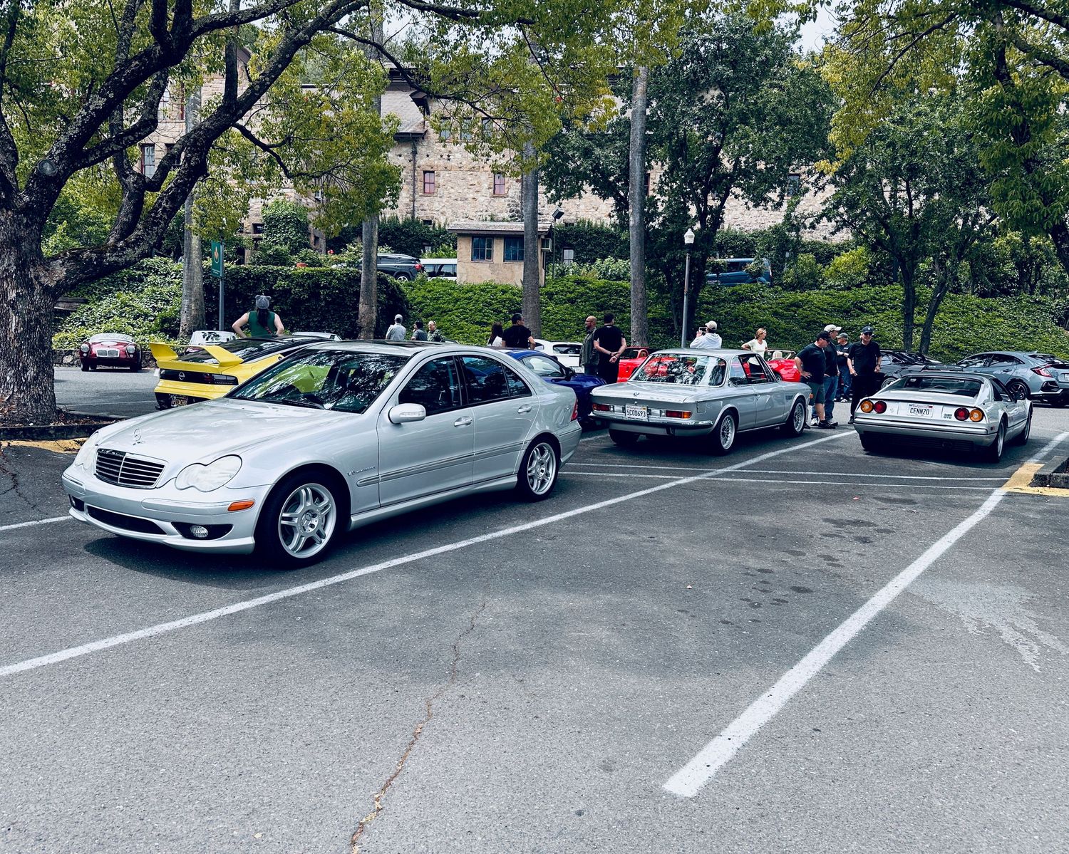 The C32 AMG parked next to a BMW E9 and a Ferrari 308 after the conclusion of Breakfast Club Rally.