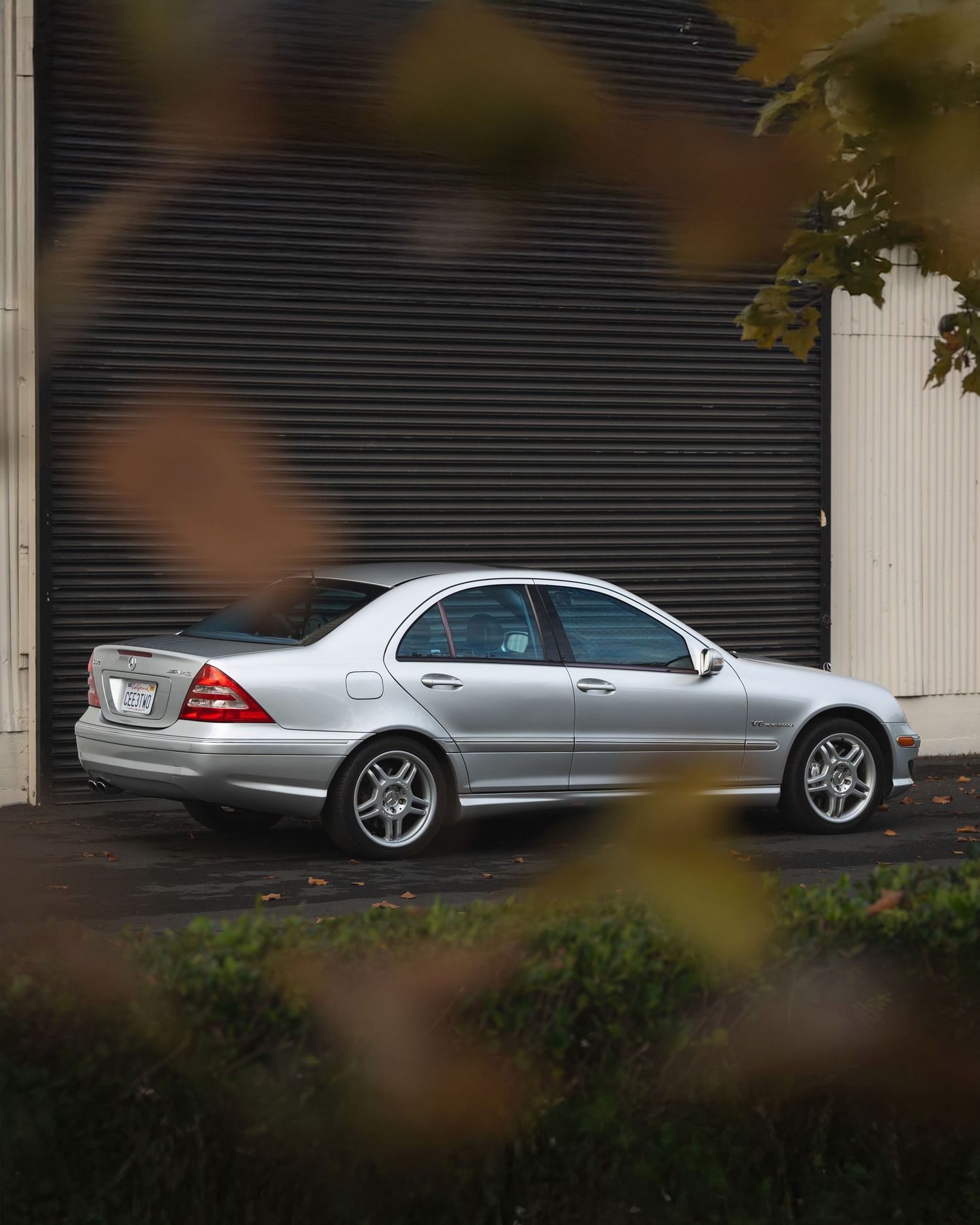 A photo of the C32 AMG sedan from the rear-passenger quarter panel, taken in the fall at Mare Island, California.