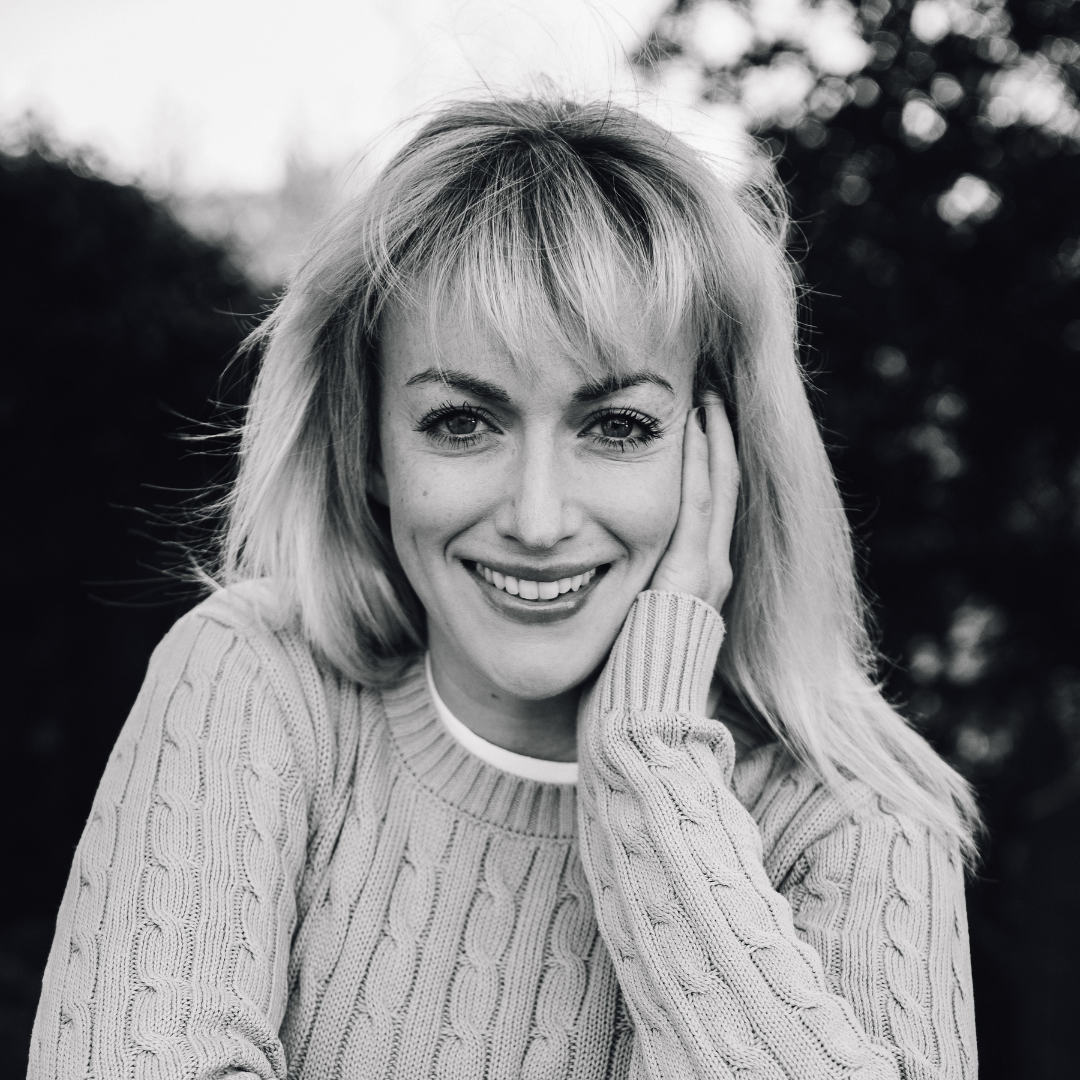 Black and white portrait series showing person in cable knit sweater expressing different joyful emotions.
