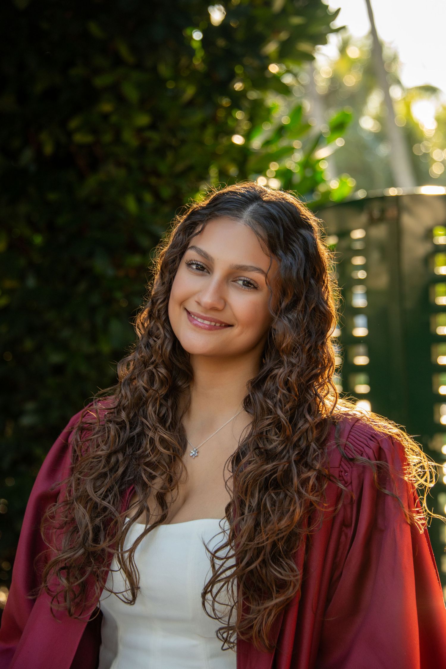 Palm Beach Gardens senior portrait with ivy backdrop