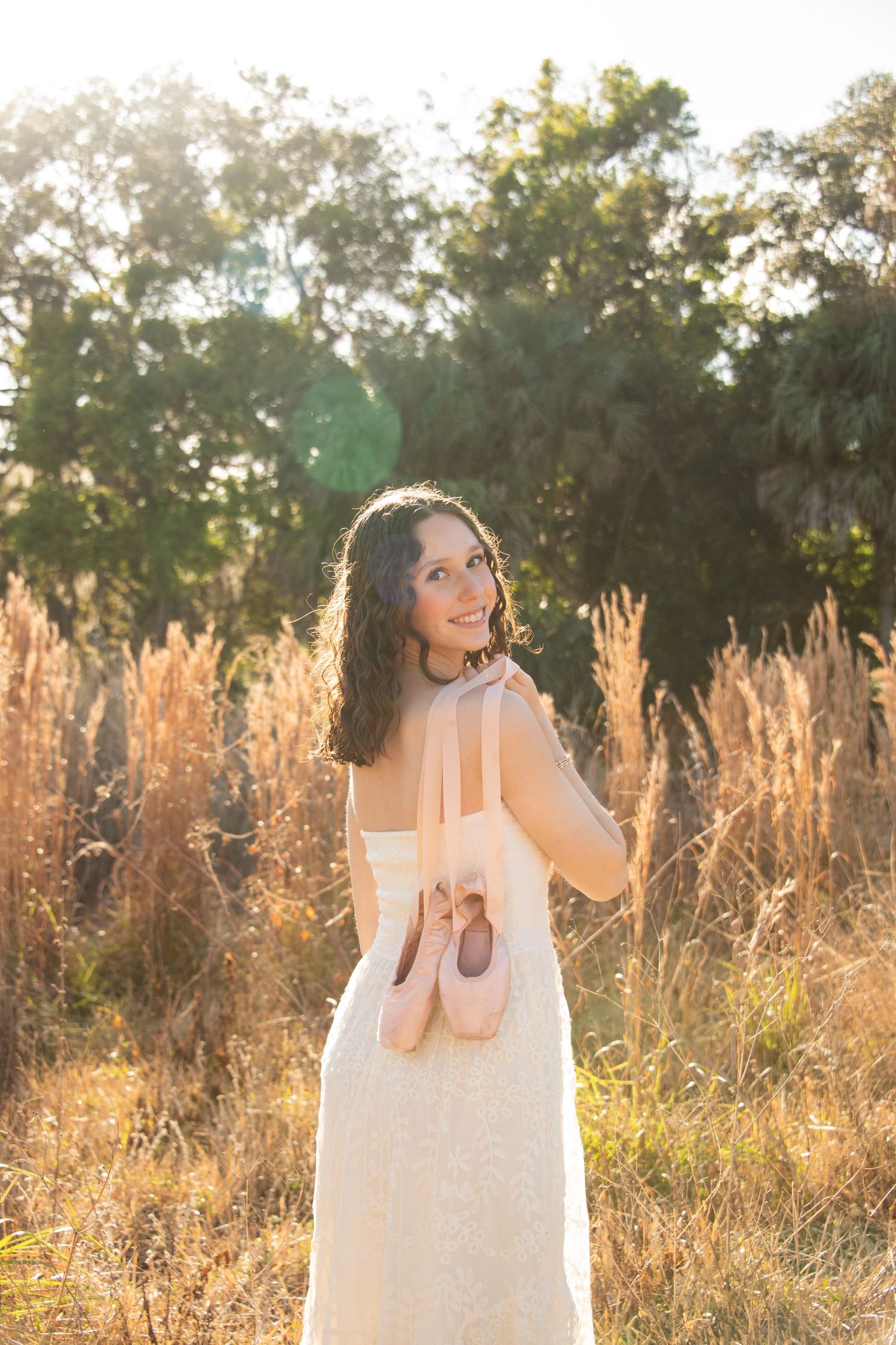 Senior portrait in Palm Beach Gardens during golden hour