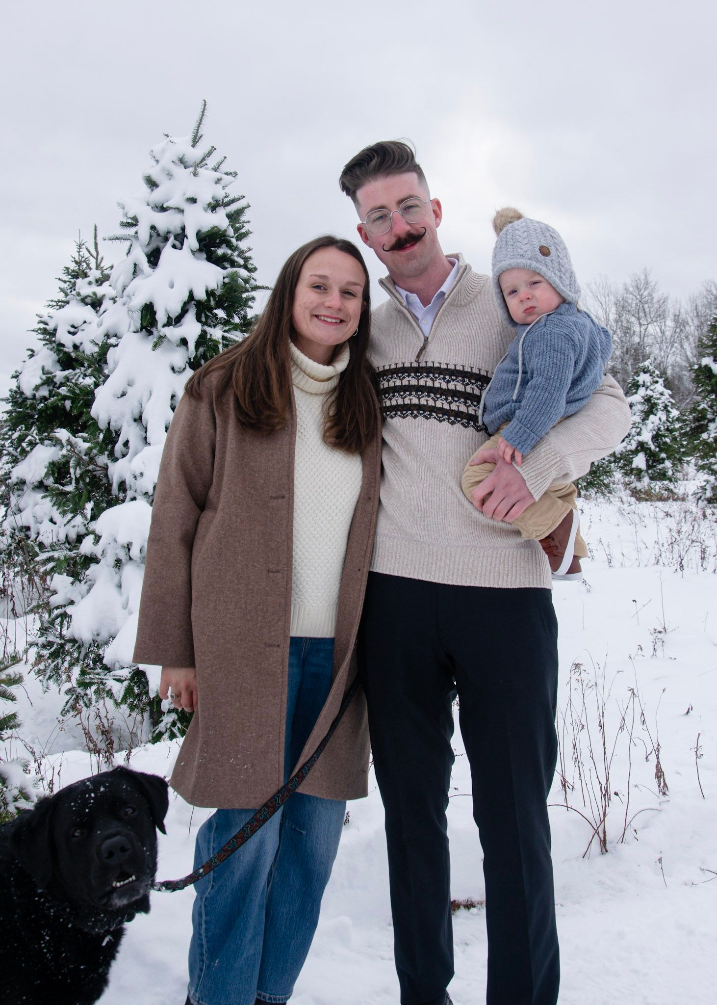 Family of four smiling during outdoor photography session 

family photographer, Halifax photographer, Nova Scotia photographer, lifestyle p