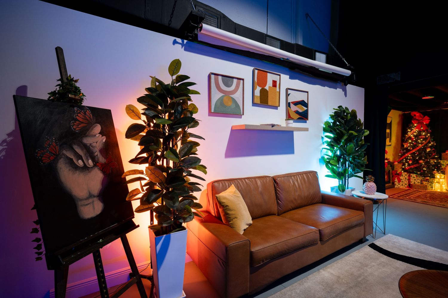 Photography studio in Miami with styled couch and decor, ideal for branding shoots and creative content.
