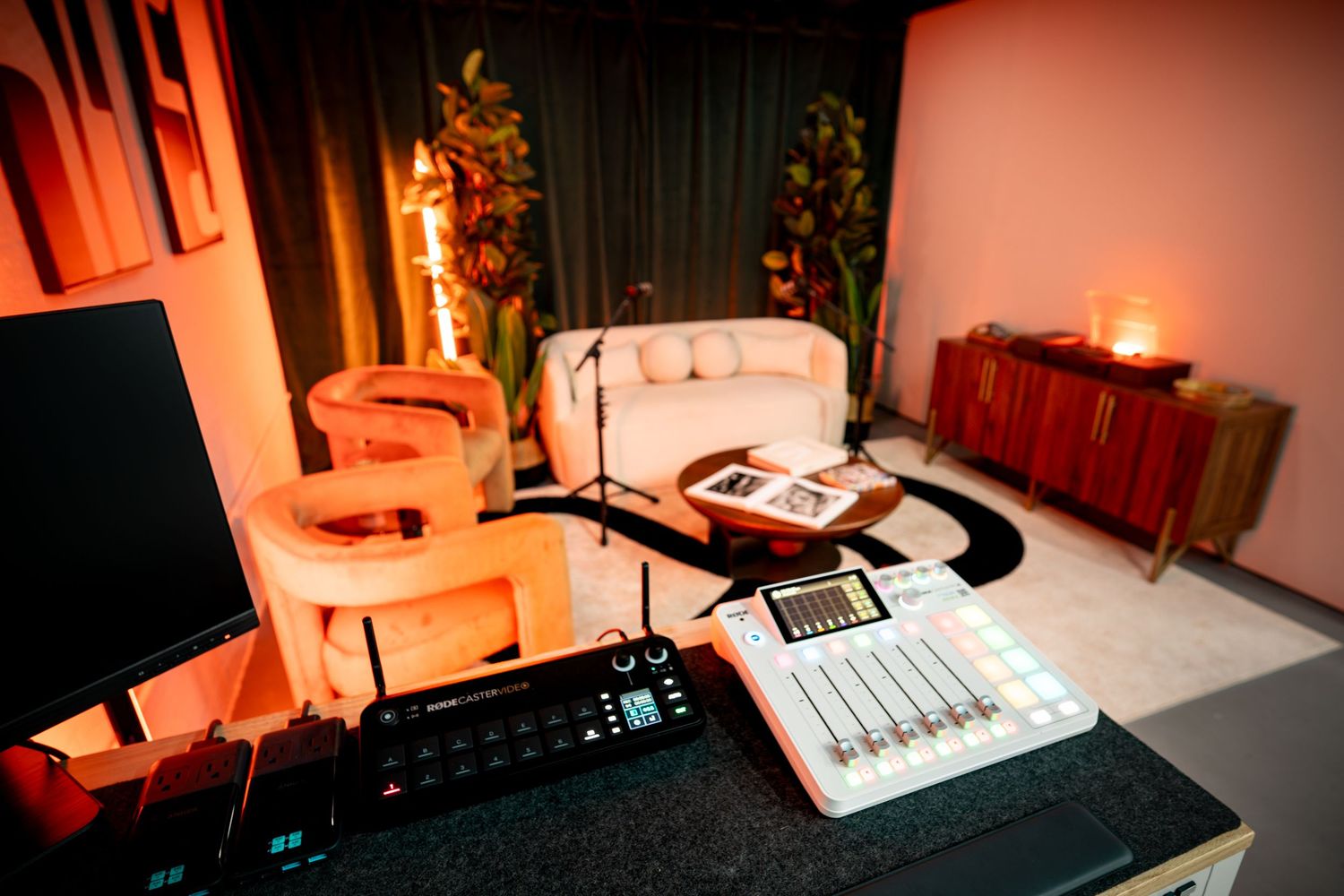 Podcast studio in Miami with mixer, microphones, and seating, built for creators and content production.