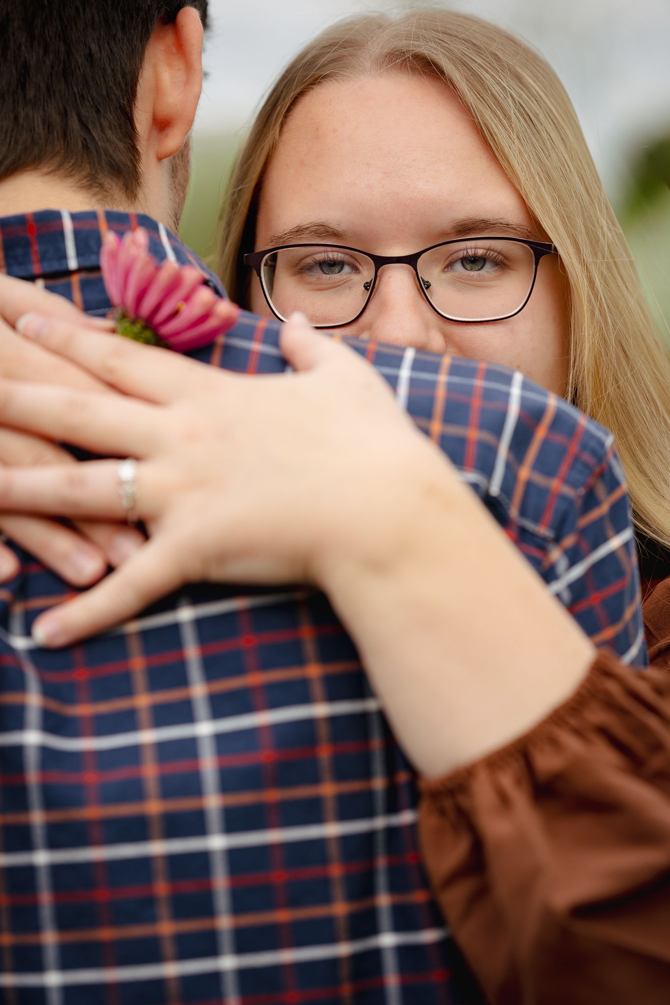 Series of close-up shots showing hands covering eyes in a playful peek-a-boo sequence. Engagement photography
