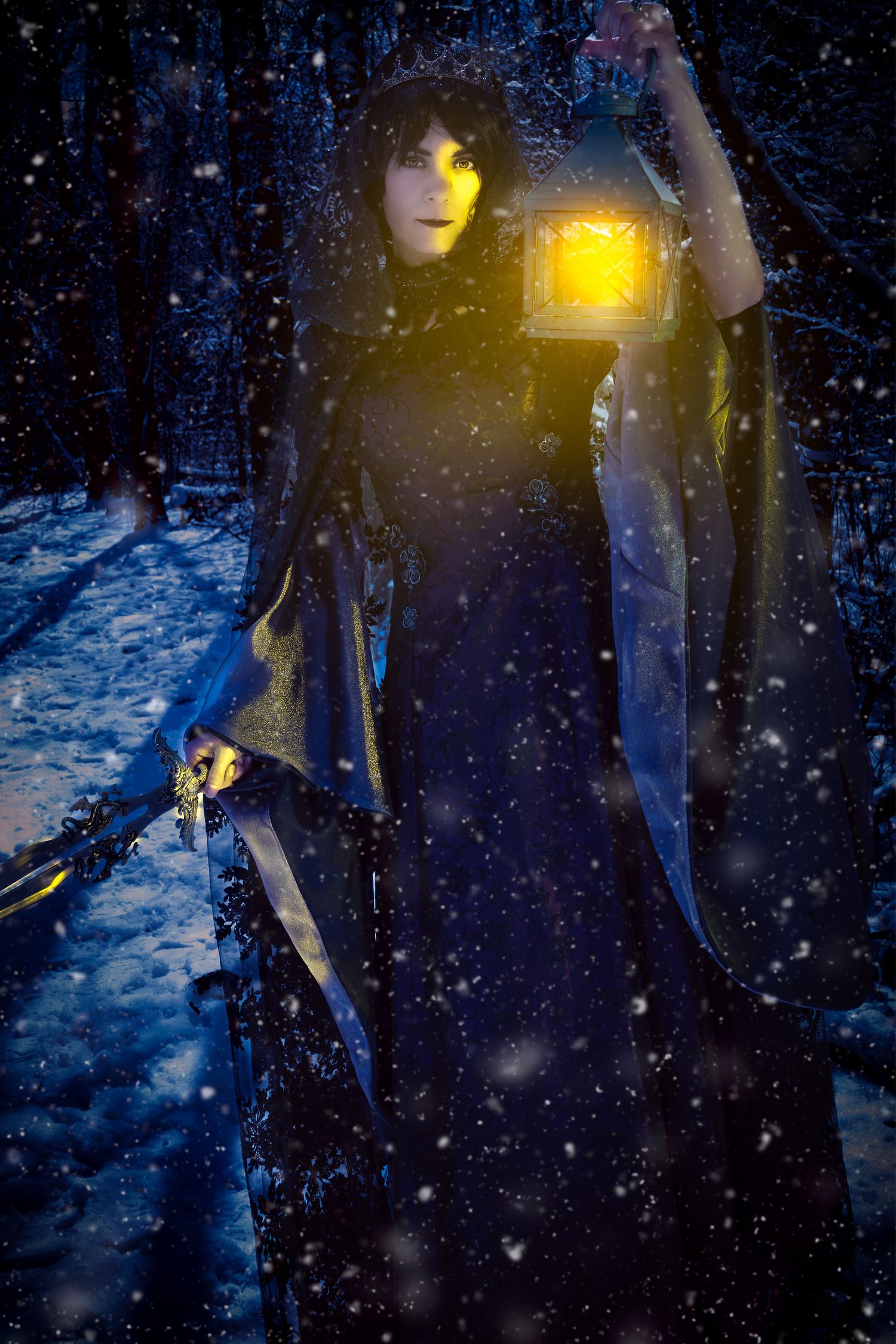 A mysterious figure in a dark cloak holds a glowing lantern in a snowy night forest.