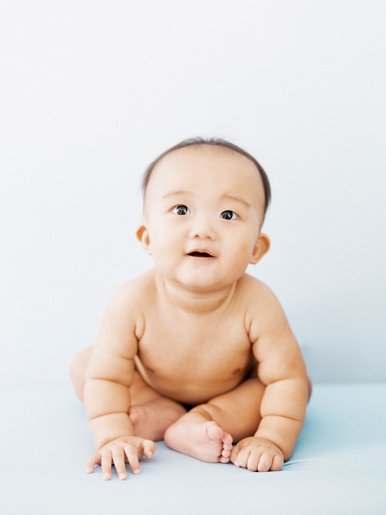 Artistic newborn and baby portraiture at Midtown Manhattan studio by STUDIO OC