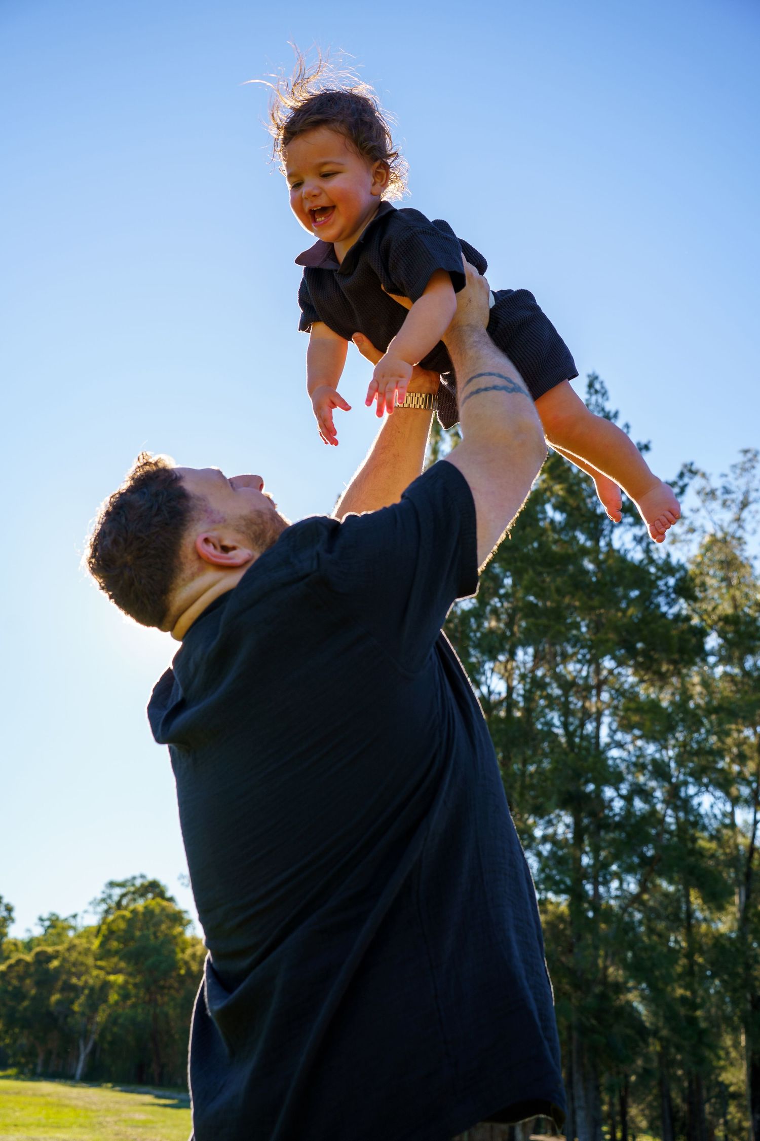 Western Sydney family photographer capturing relaxed, heartfelt moments between parents and children