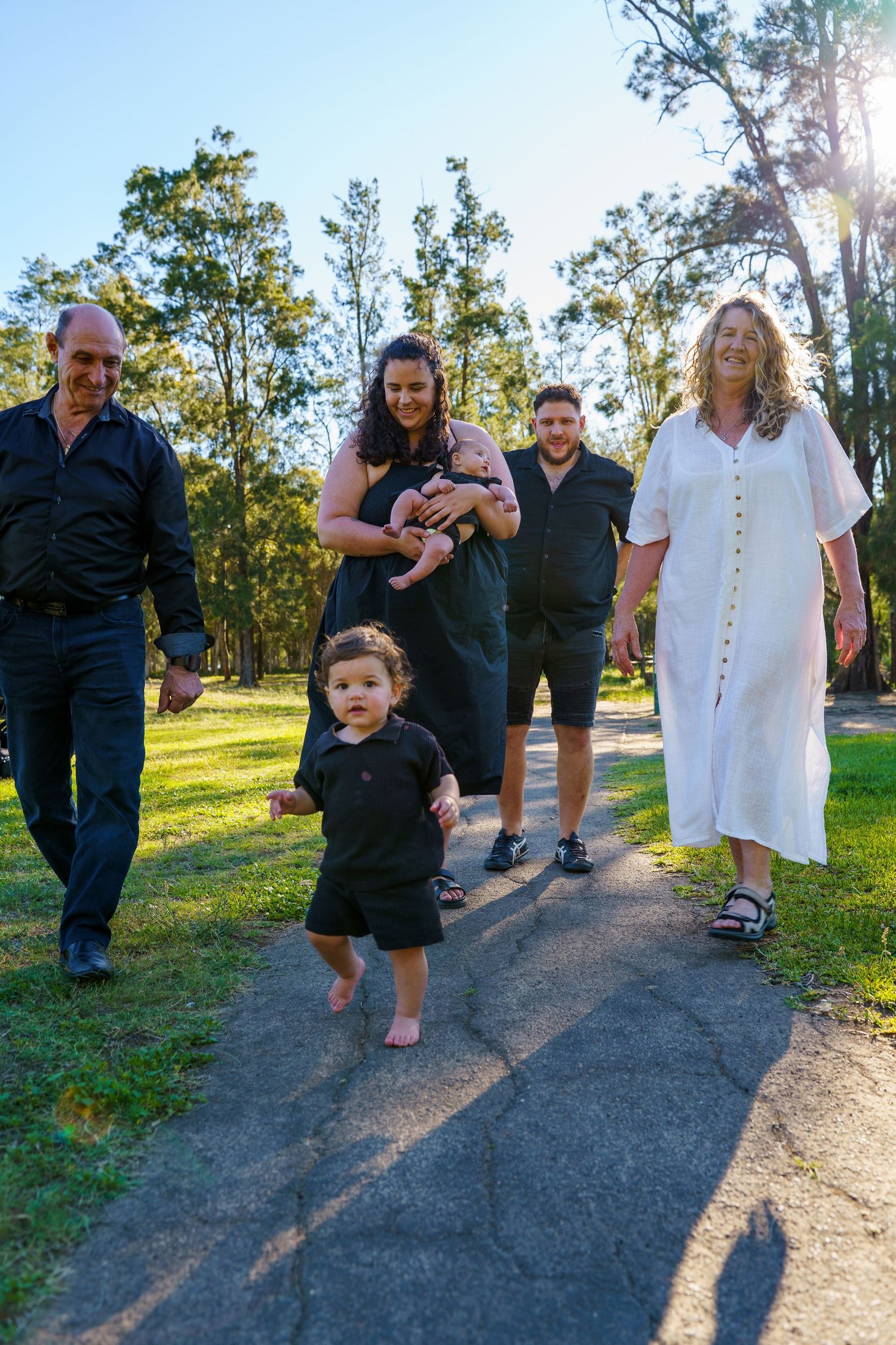Western Sydney family photographer capturing relaxed, heartfelt moments between parents and children